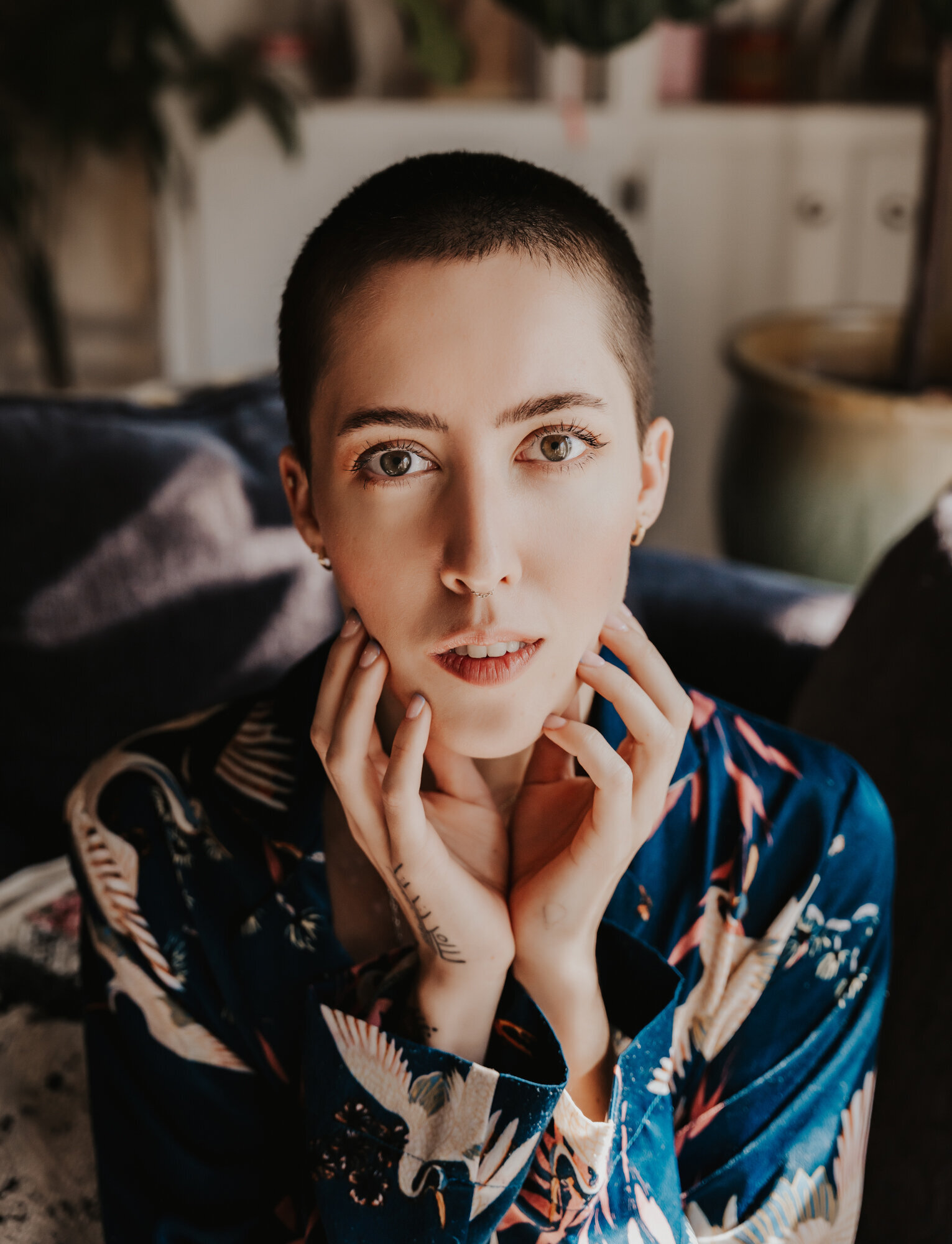 Branding Photographer,  woman wears kimono and sits in living area