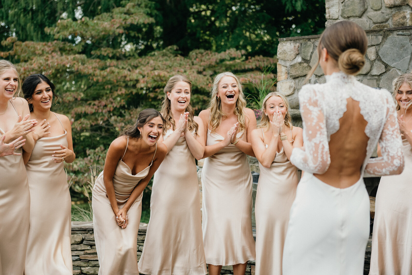 Bridal party laughter during a Radnor Hunt Club wedding.