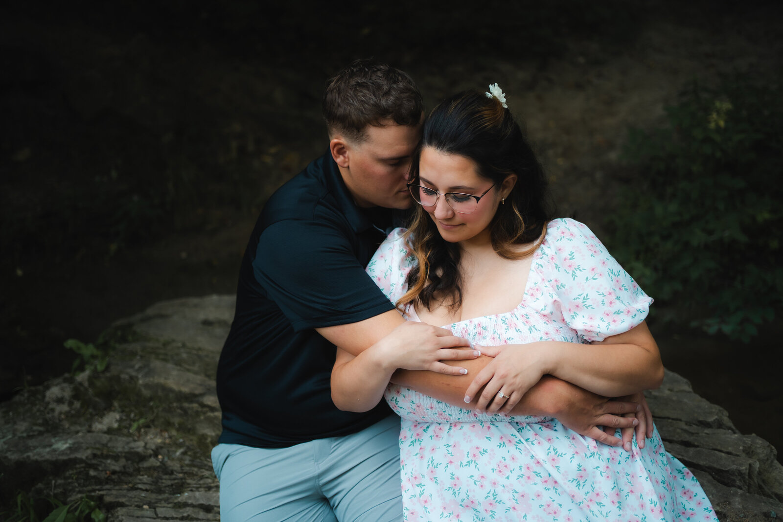 romantic engagement photos couples sitting poses engagement photographer Des Moines Iowa