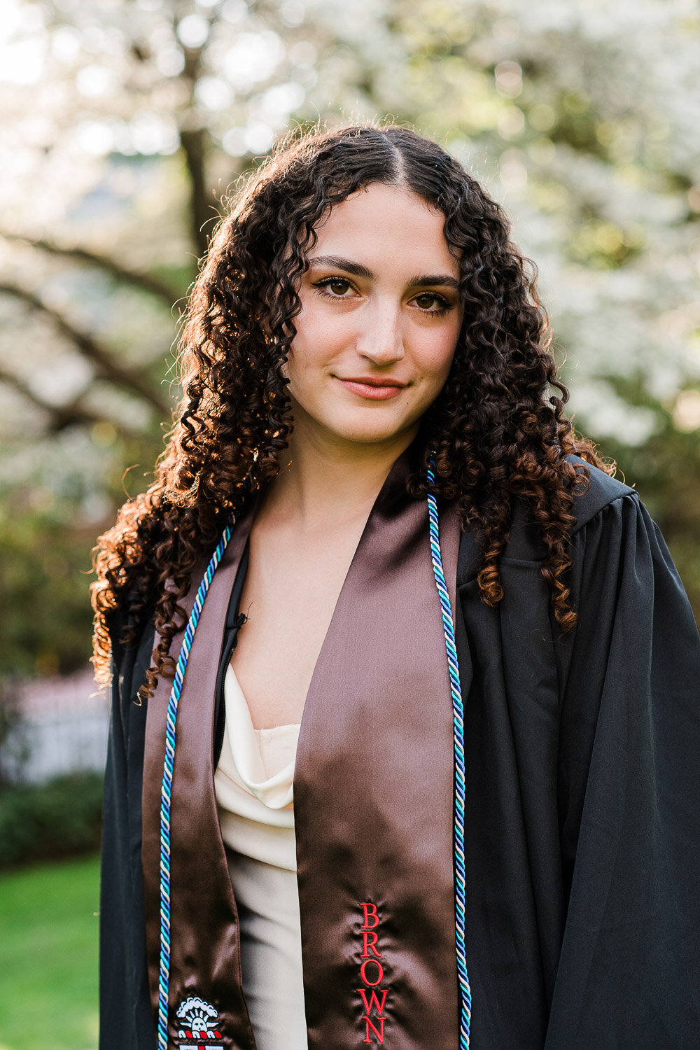grad portrait with robe and  sash
