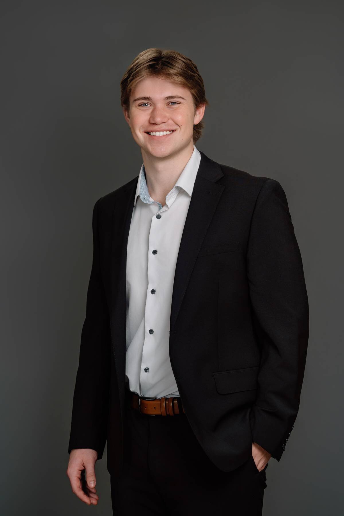 Studio headshot of an entrepreneur man, capturing his entrepreneurial spirit and determination