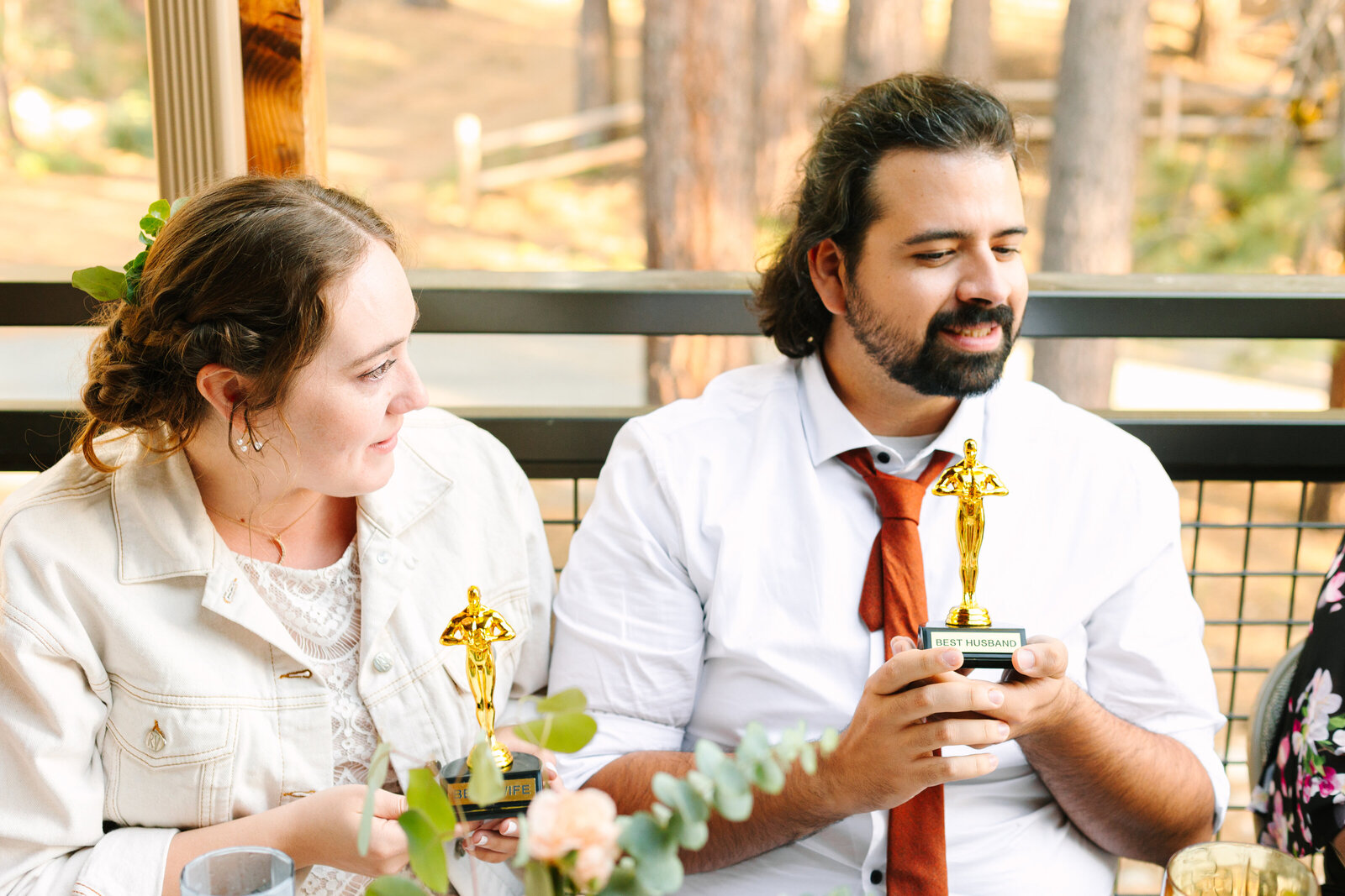 A couple celebrates their intimate elopement at a cabin at Big Bear Lake, California.