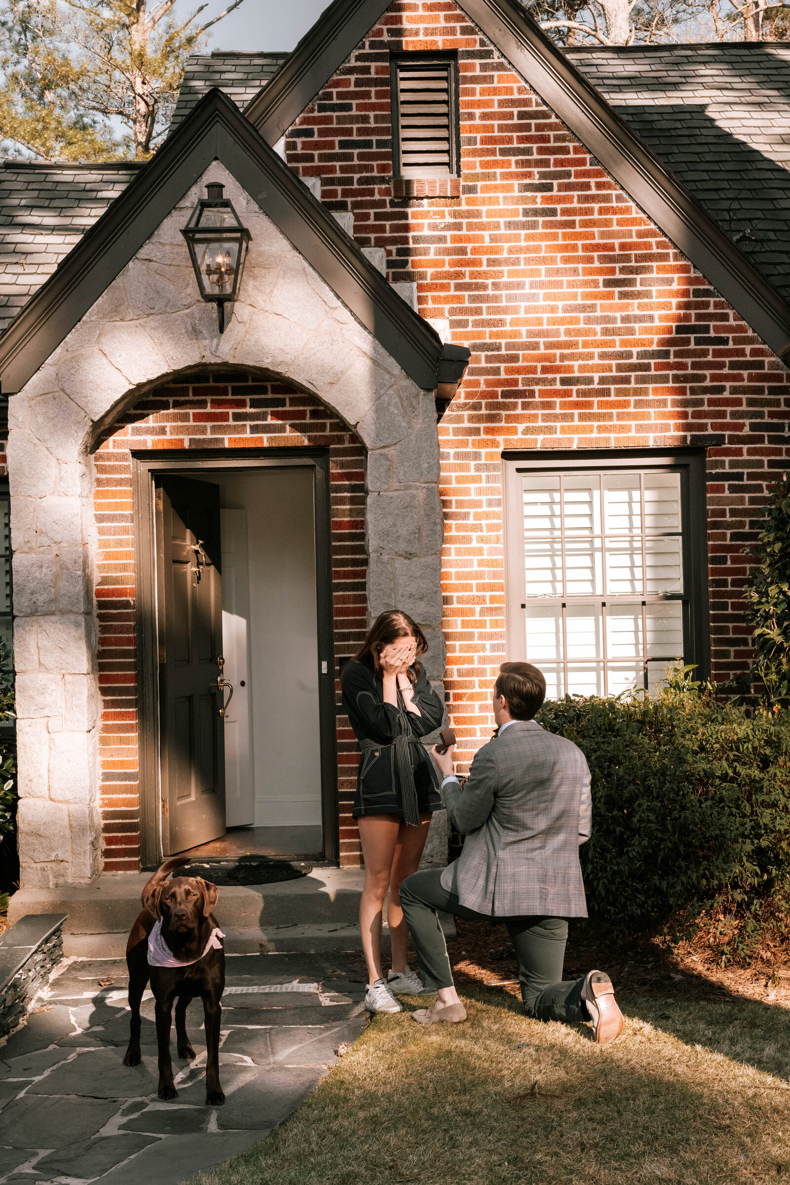 proposal outside their new home