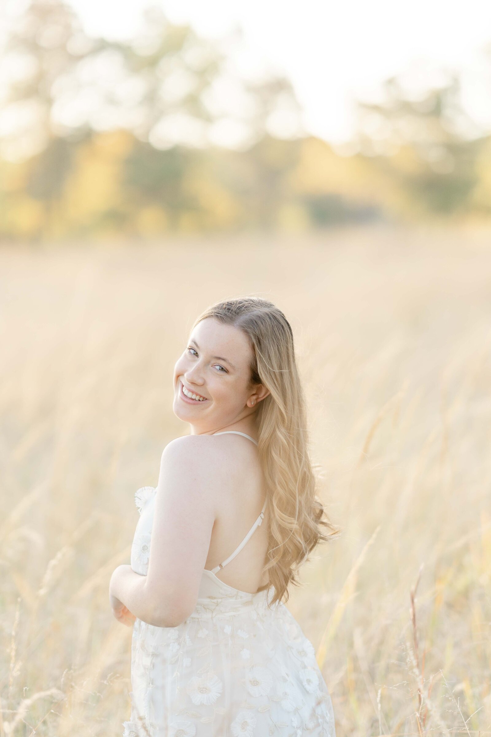 girl looking back taken by Asburn, VA senior photographer