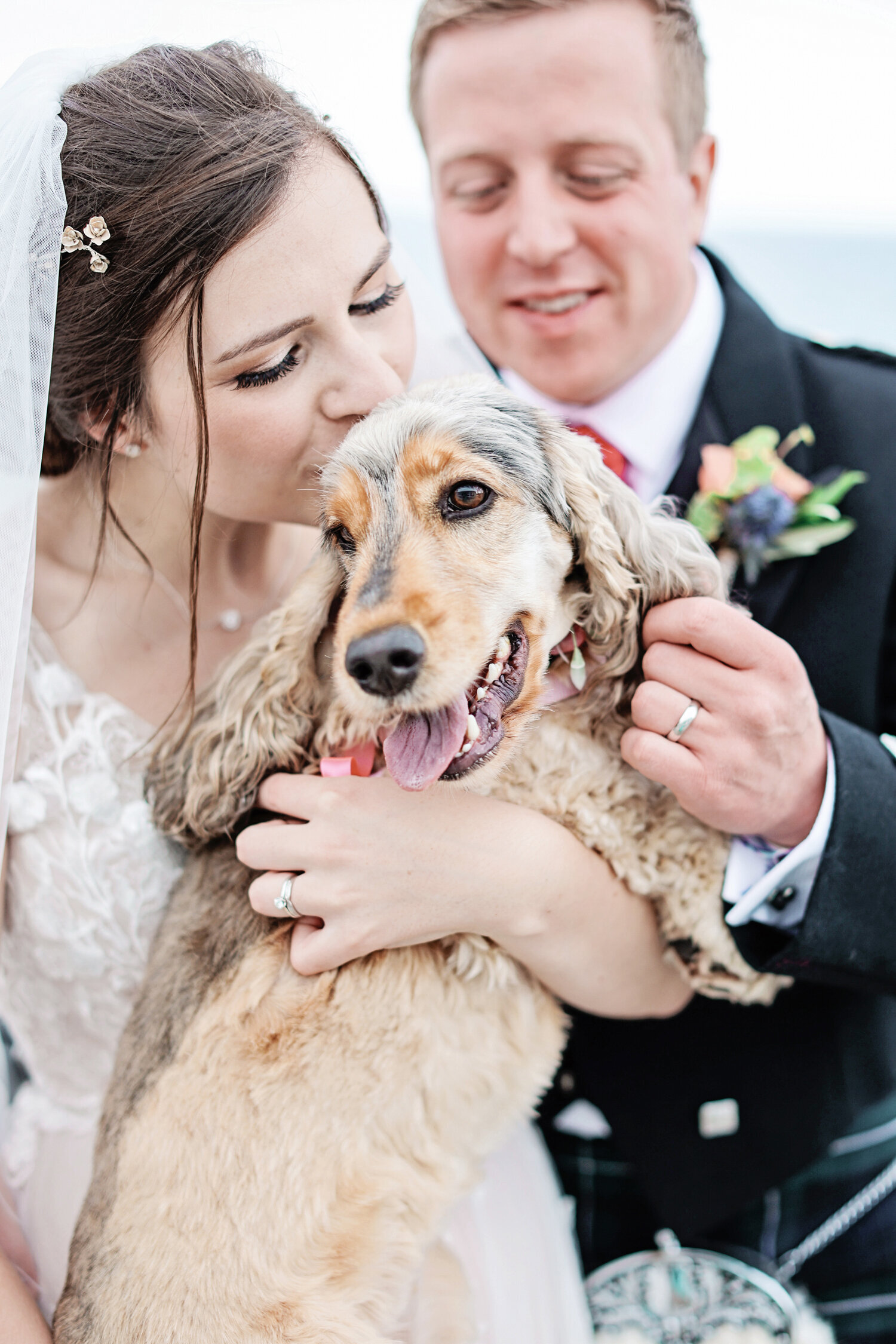 bride-and-groom-anddog-at-wedding