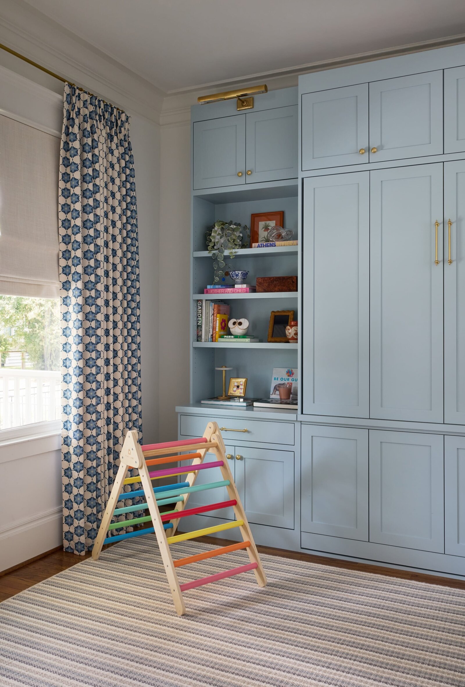 vision and hammer light blue painted cabinets with blue and white curtains