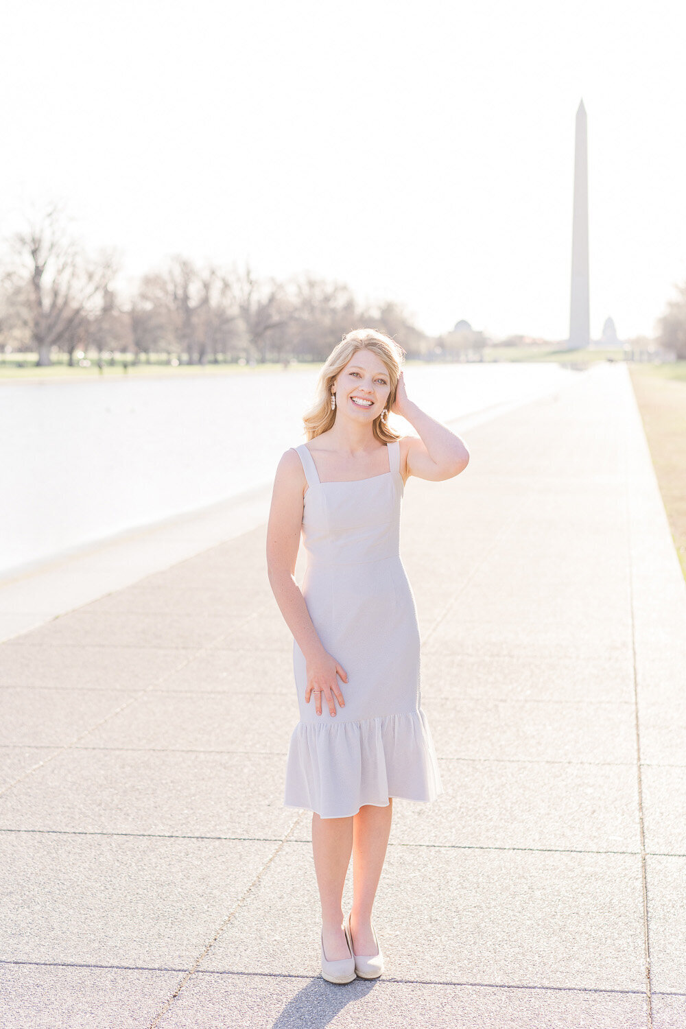 college senior girl with Washington Monument in the background