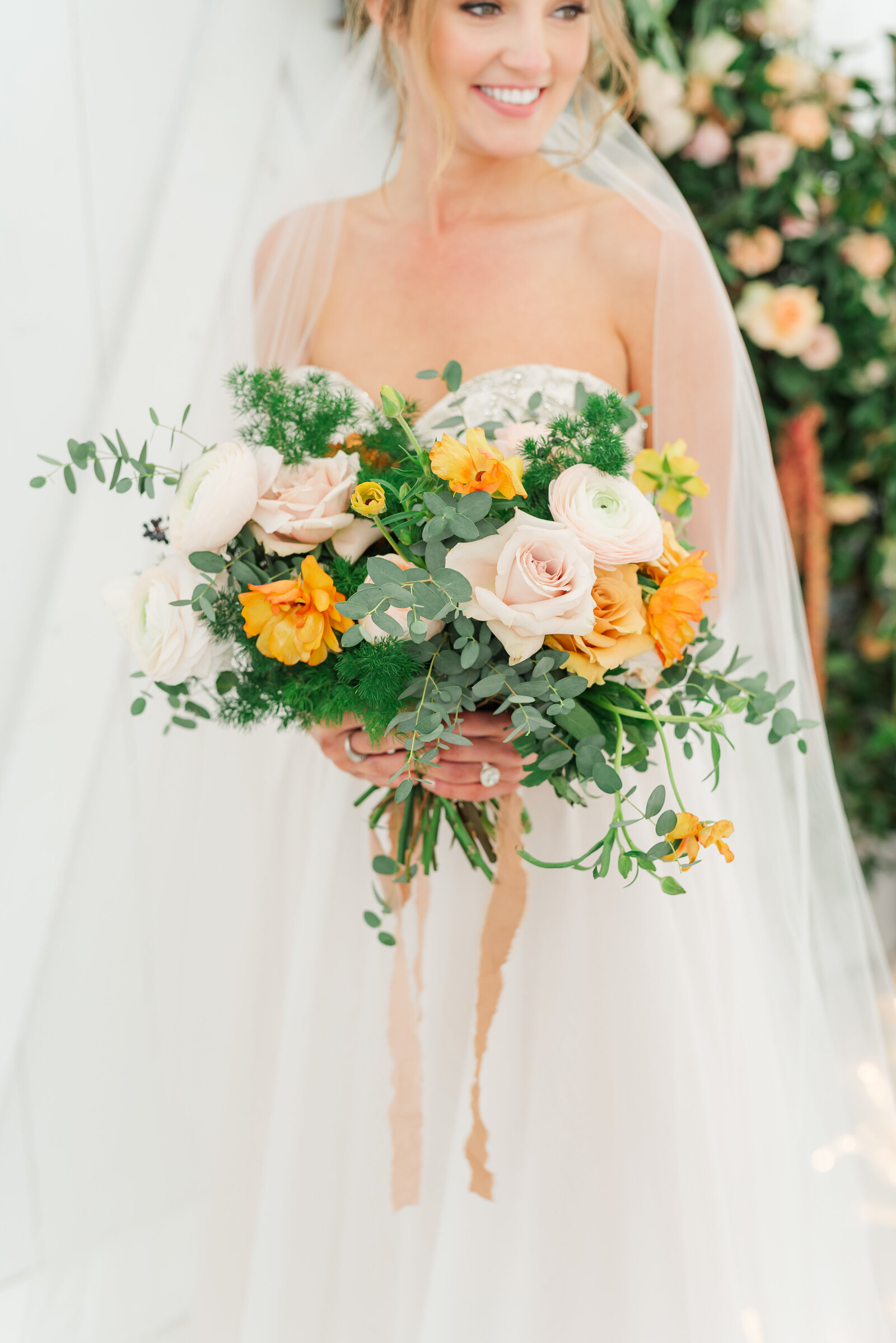 bride holding her bouquet at texas wedding venue