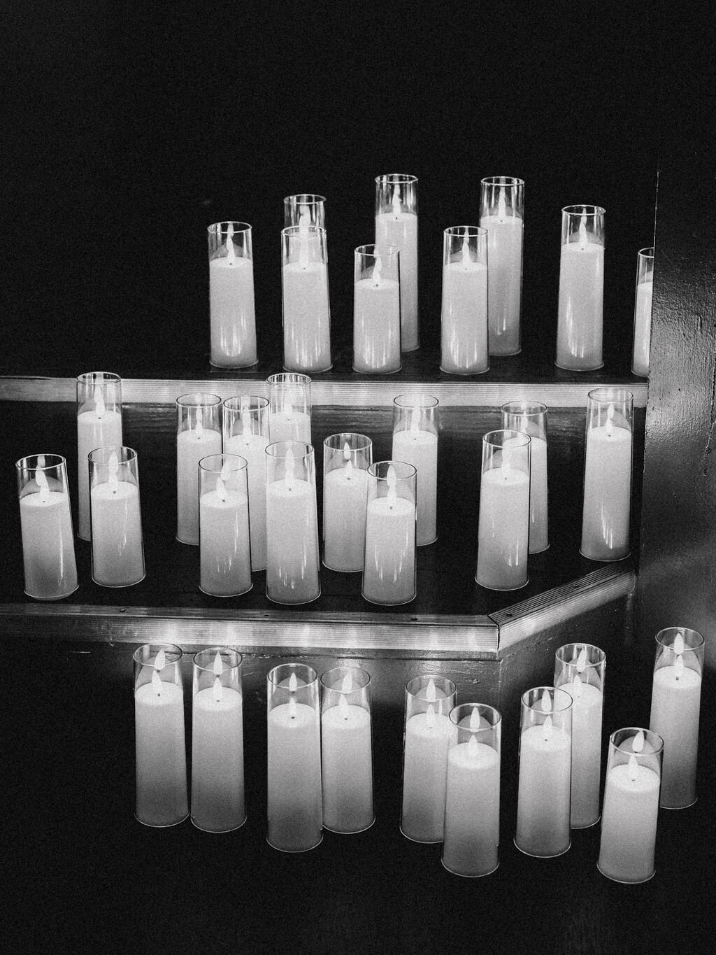 White candles at wedding reception