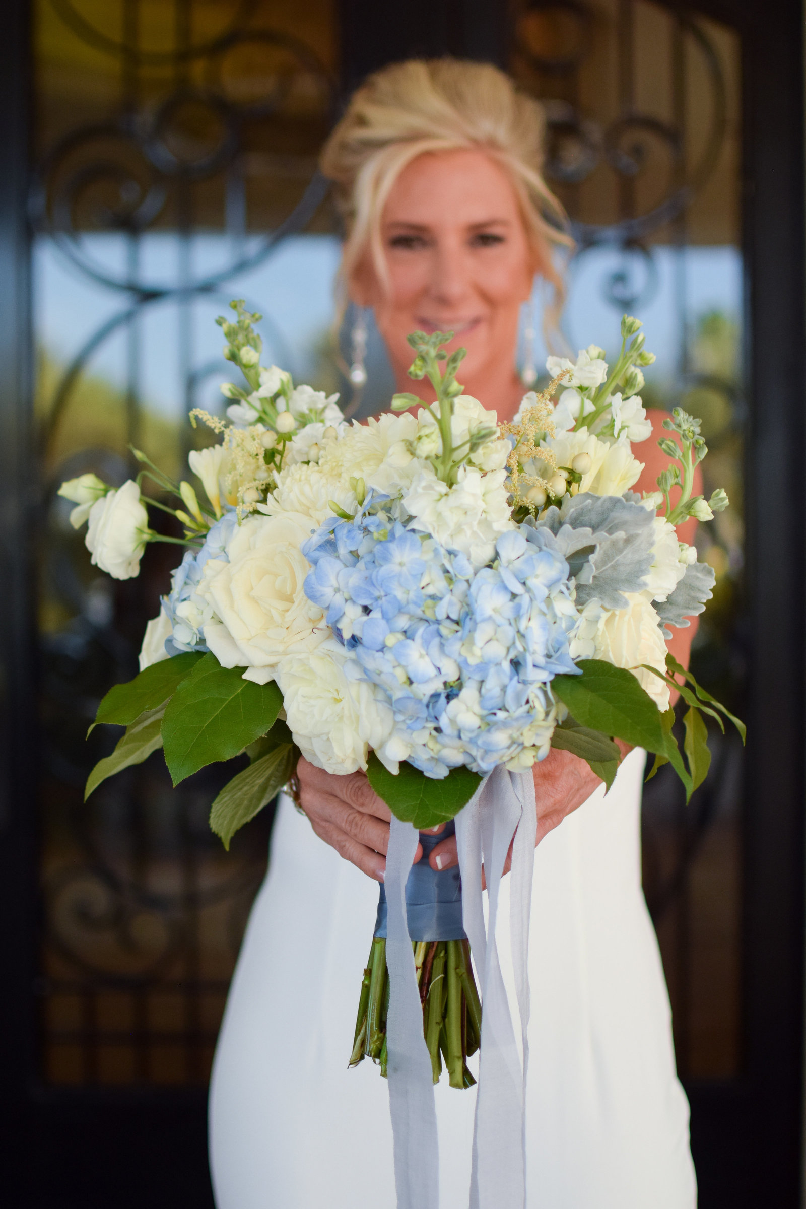 Wedding Bride Bouquet Hydrangea White and Blue Wedding Bridal Portrait Updo simple chic white dress One Ocean Resort Jacksonville Florida