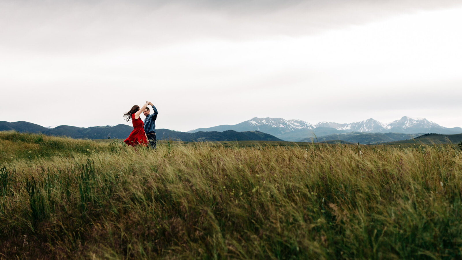 Experience the magic of love amidst Montana's majestic mountains with our captivating couple dancing photo collection. Celebrate your romance against the backdrop of sweeping vistas and pristine wilderness as you twirl and embrace in nature's embrace. Let our stunning images capture the joy and intimacy of your connection, creating timeless memories against the breathtaking beauty of the Montana mountains