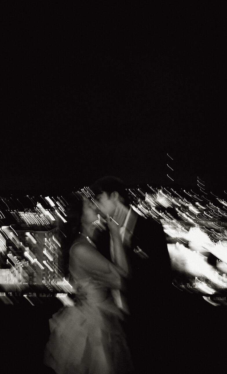 Couple Kiss at night with Pittsburgh Skyline