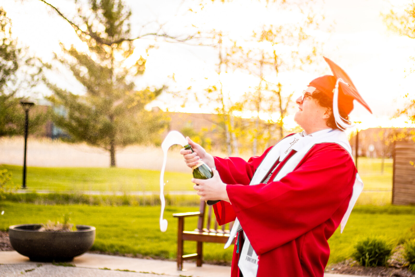 Guy college senior photos SVSU cap and gown