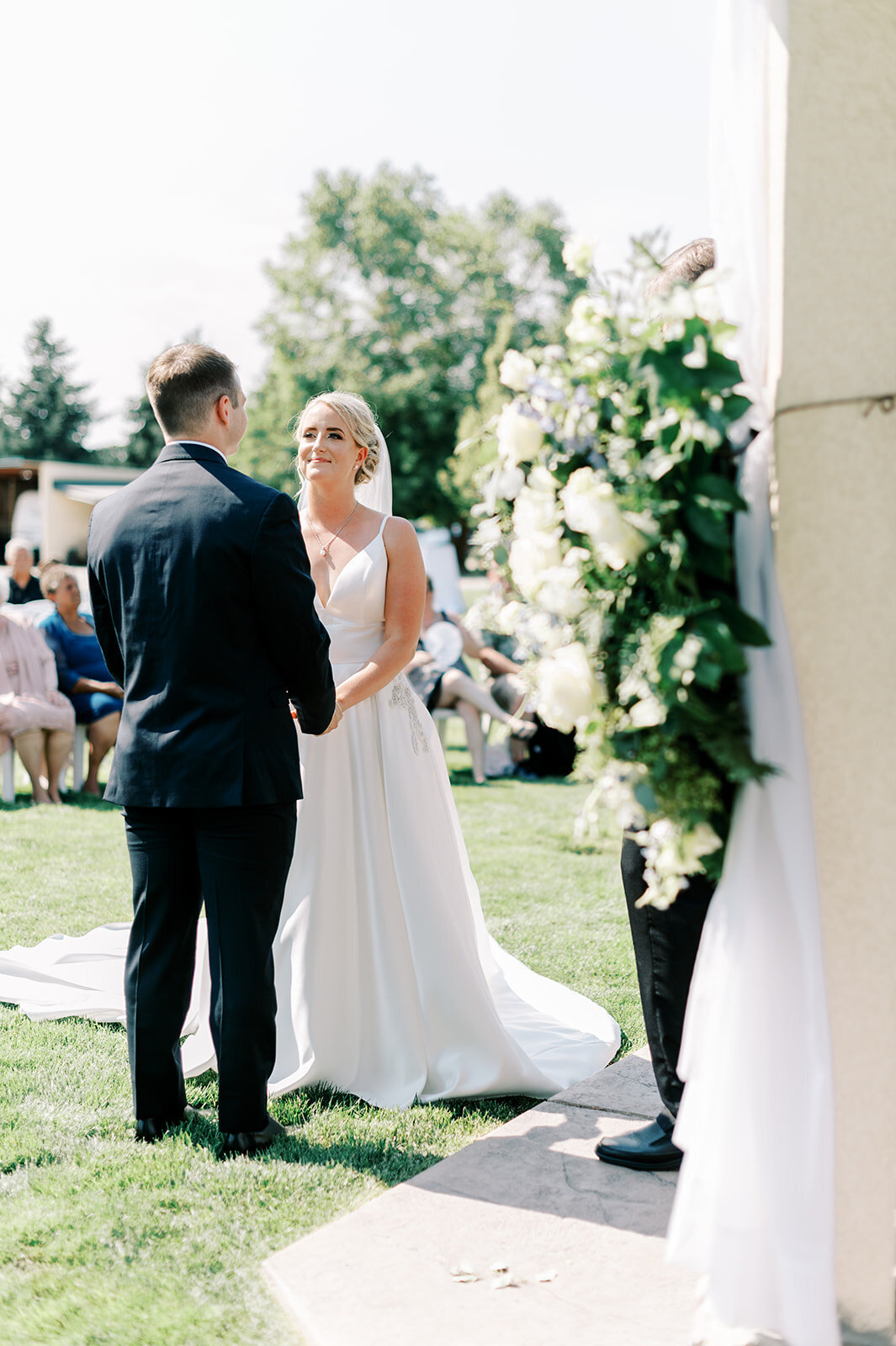 Wedding ceremony at Boise wedding venue, Honalee Farms, taken by the Best Boise Wedding Photographers