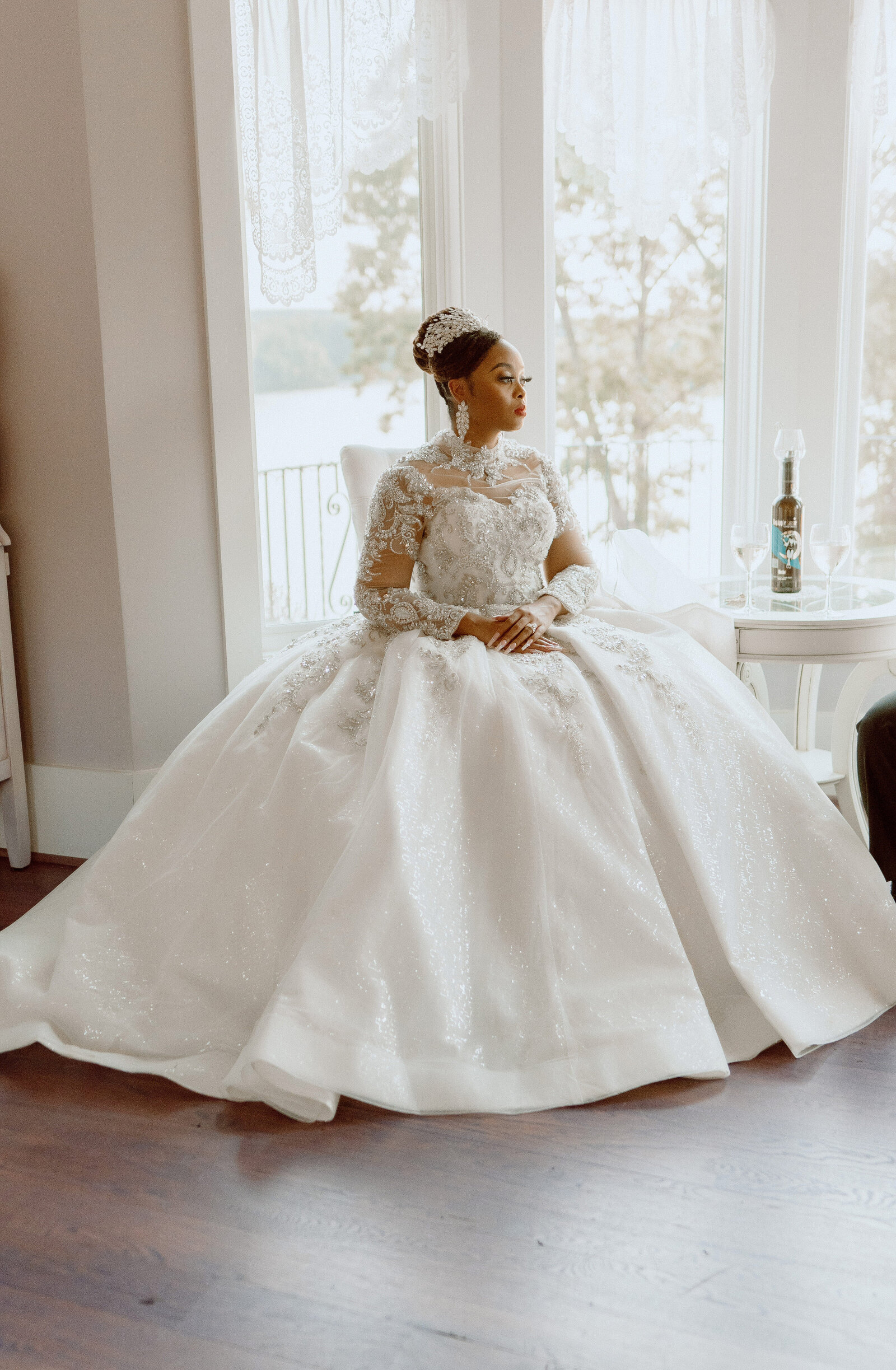 Stunning bride in a ballgown-style wedding dress, preparing for her big day in Raleigh, NC.