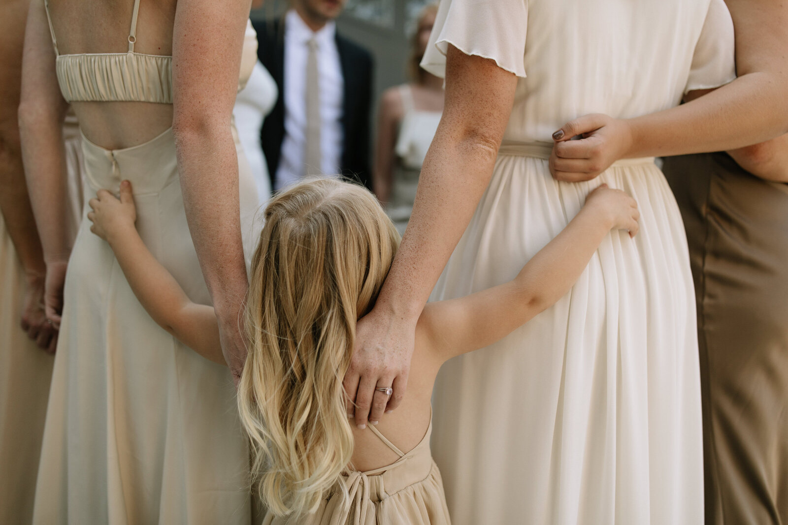 Bridesmaids hugging in prayer circle by Washington elopement photographers