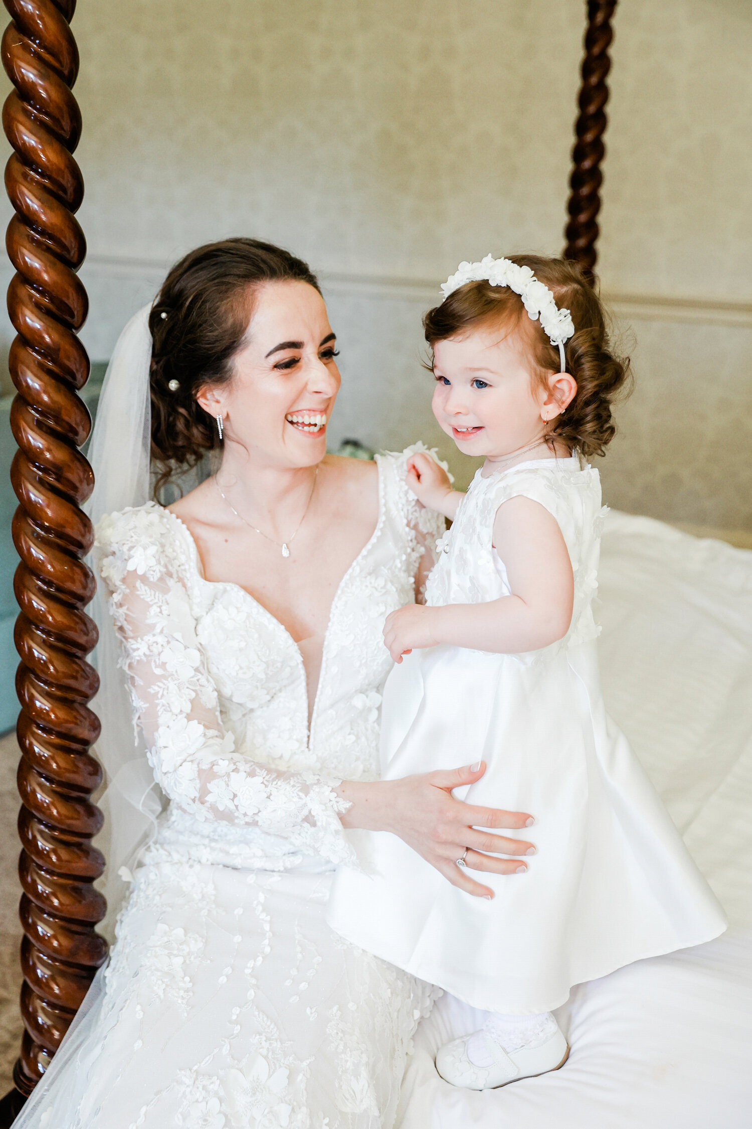 bride-with-flower-girl-in-headband