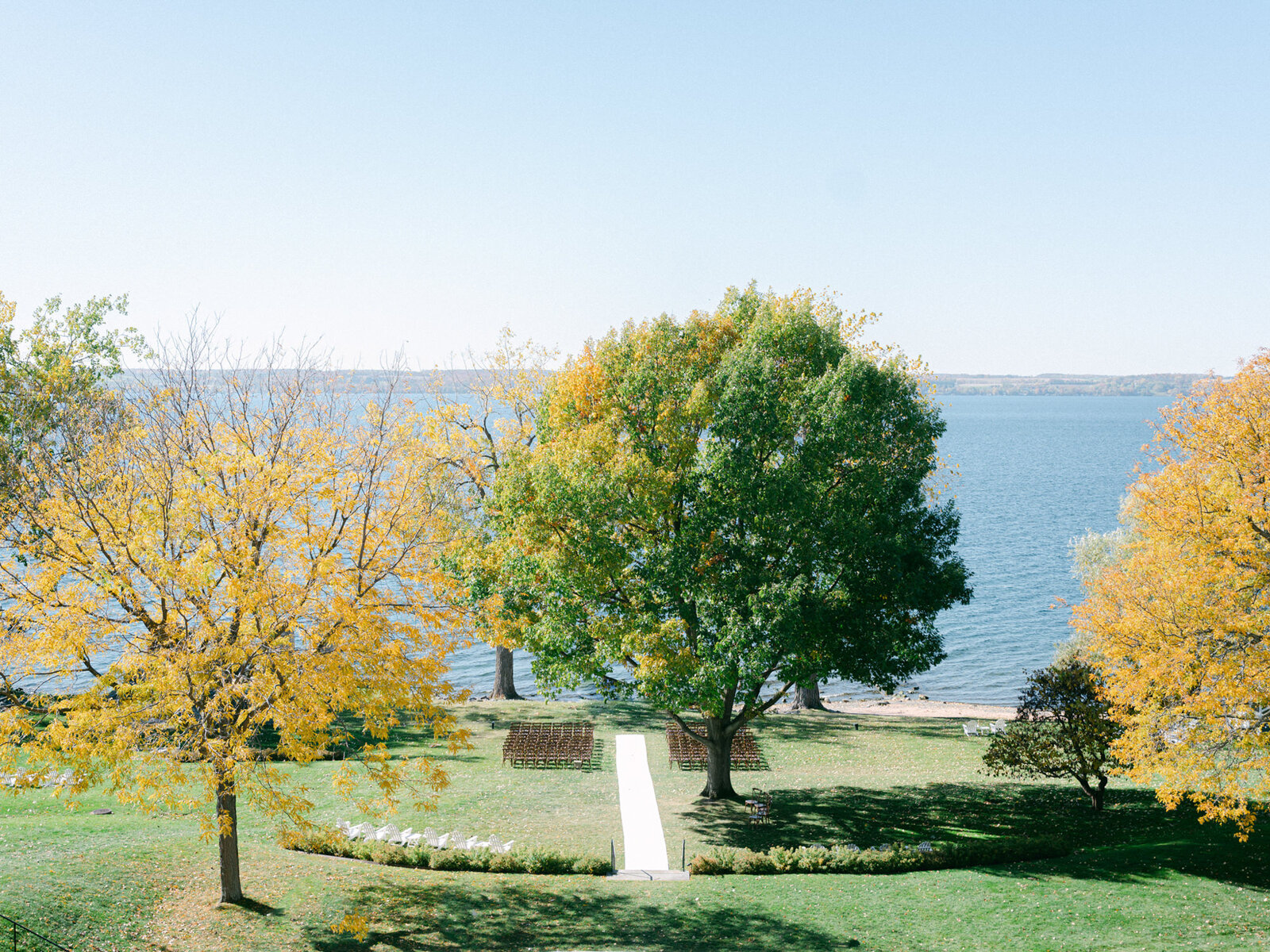 View of the finger lakes and wedding ceremony set up at Inns of Aurora.