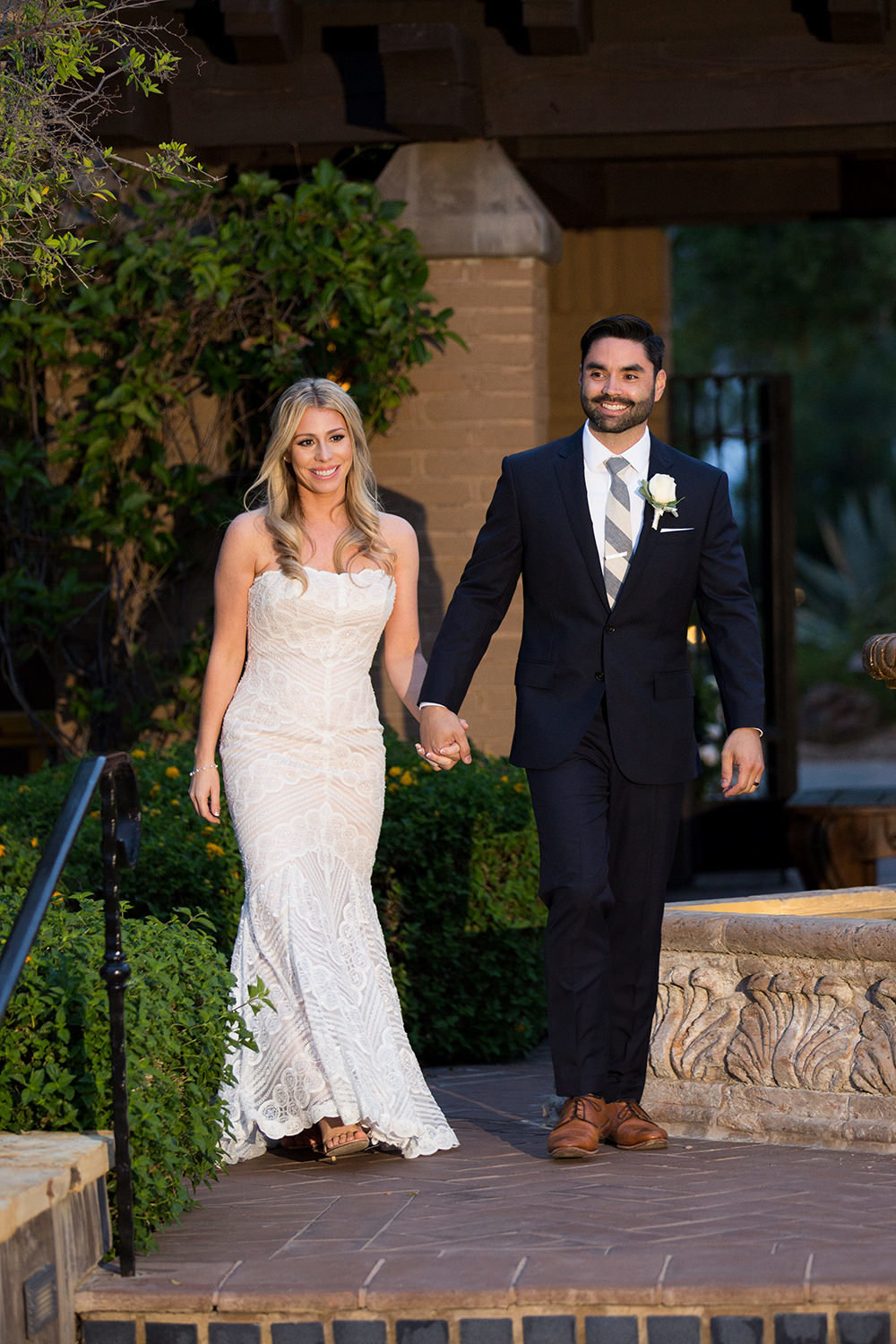 couple walking in to the reception