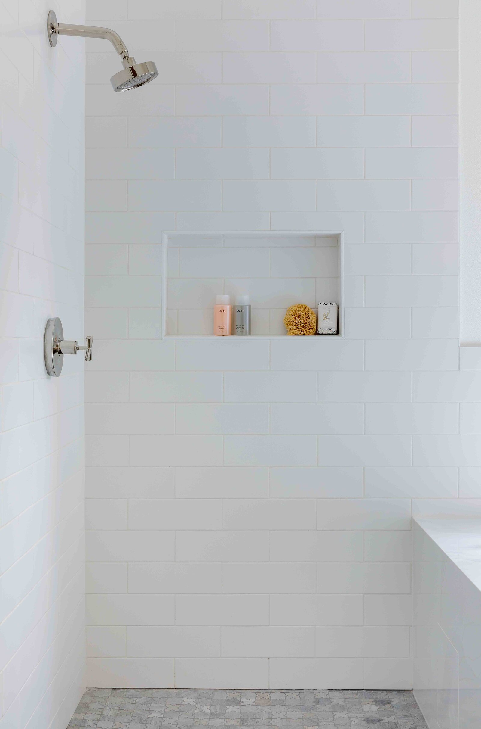 Nuela Designs White Tile Shower Marble floor