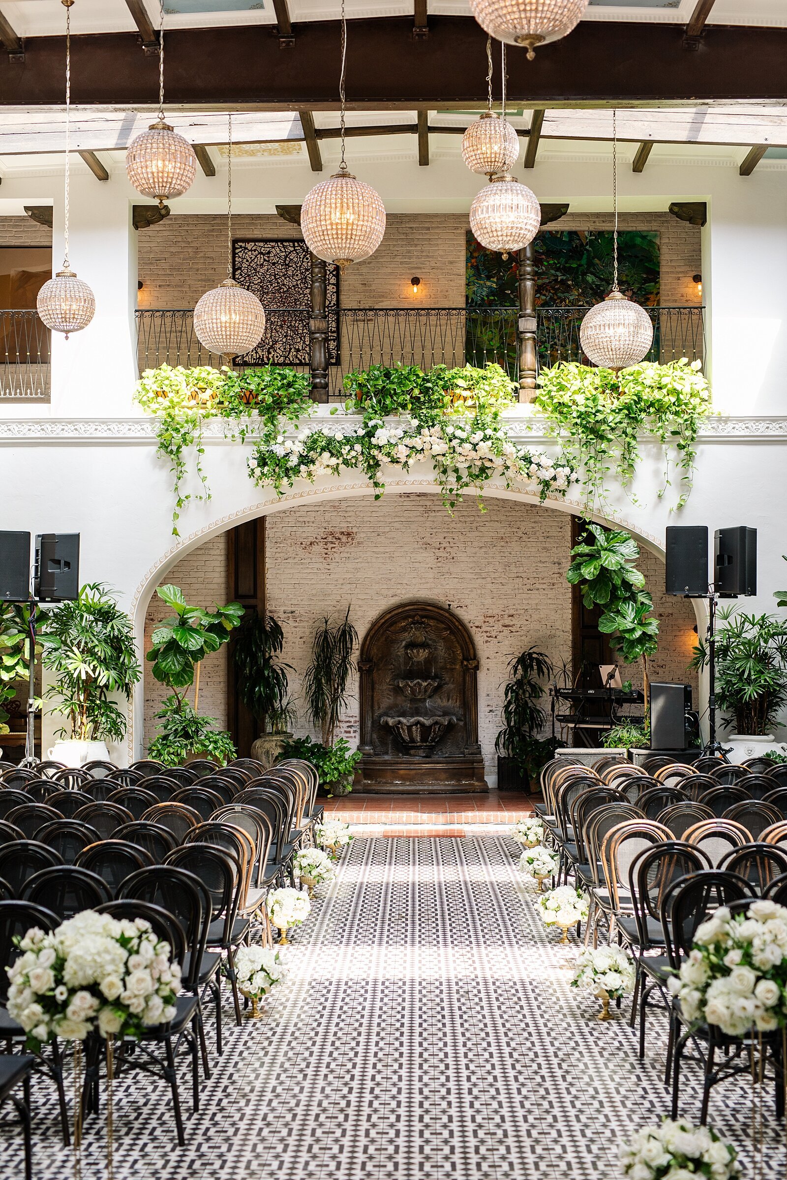 Wedding ceremony decor at the Ebell of Long Beach by wedding photographer, Sherr Weddings, serving San Diego and Orange County.