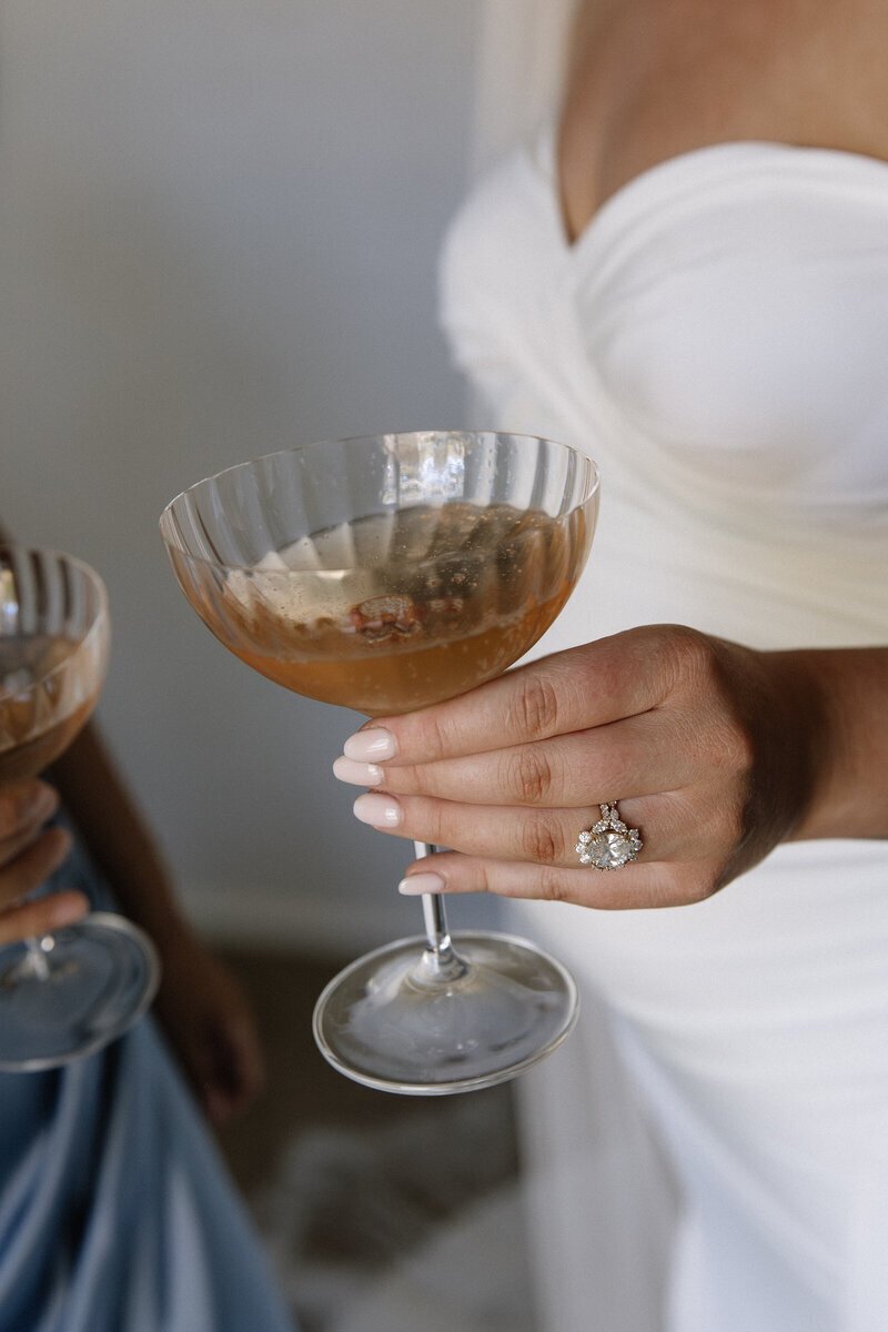 Bride holding drink by wedding photographer northern california Erica Rochelle Photography