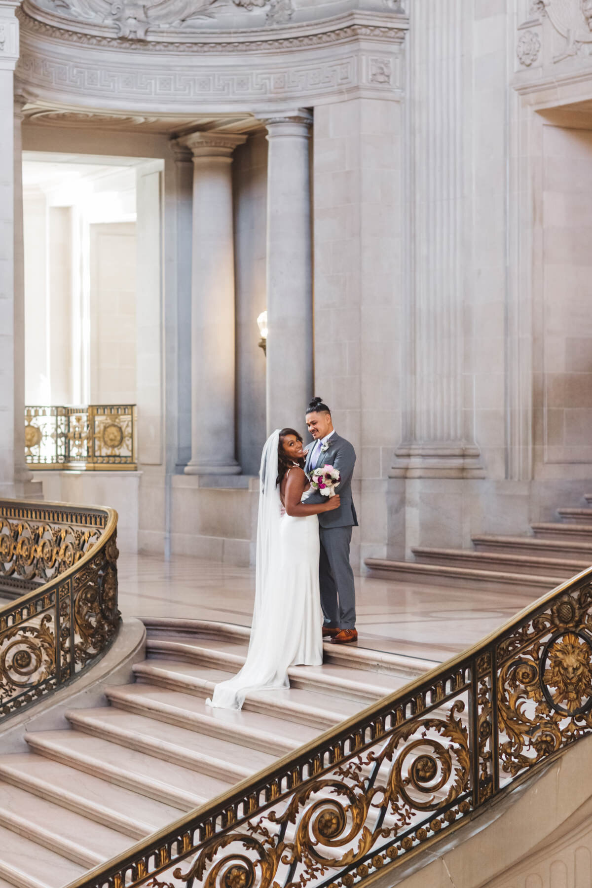 Black and Filipino couple at the top of Grand Staircase