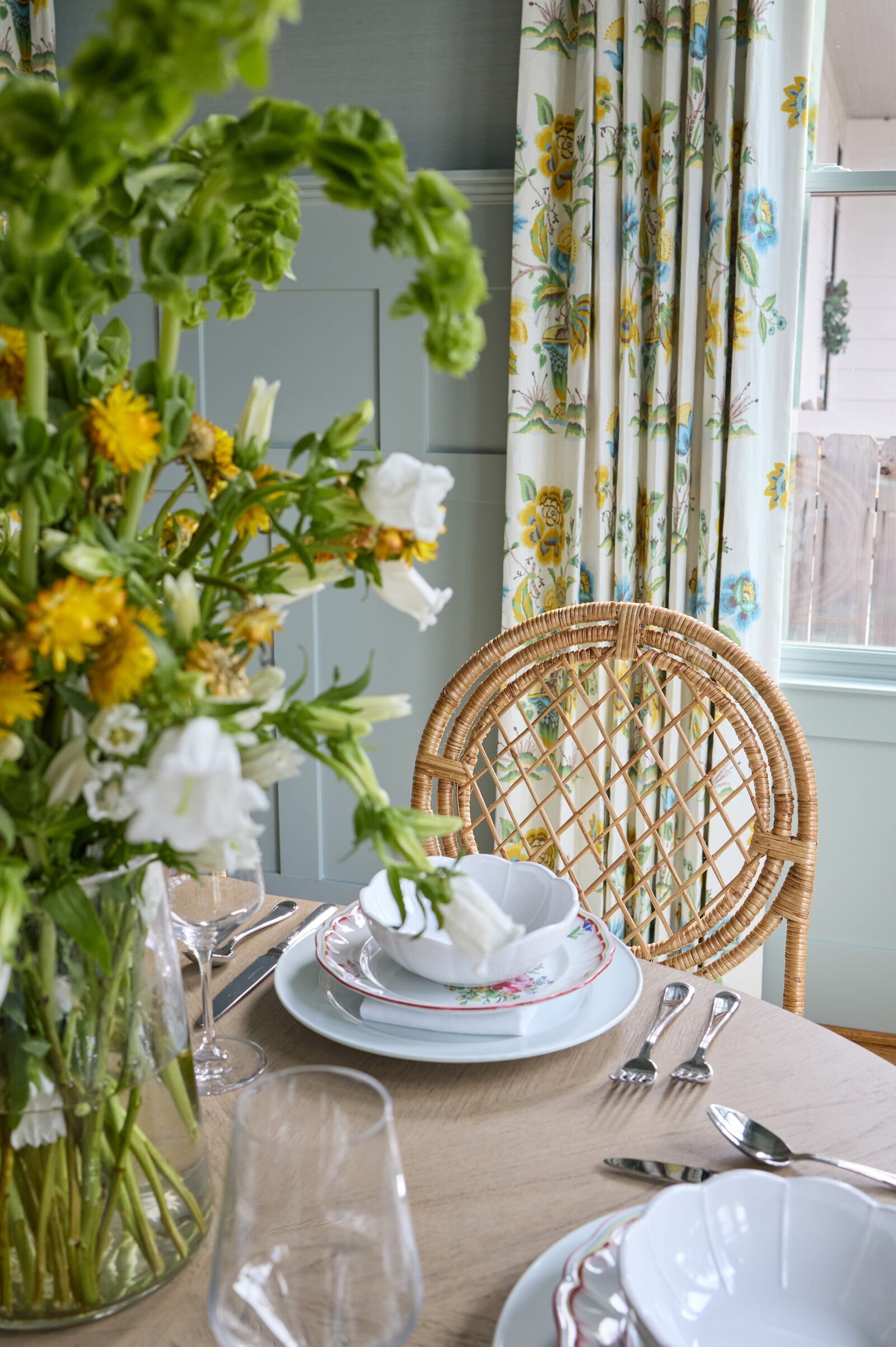 vision and hammer dining room chair and floral curtains