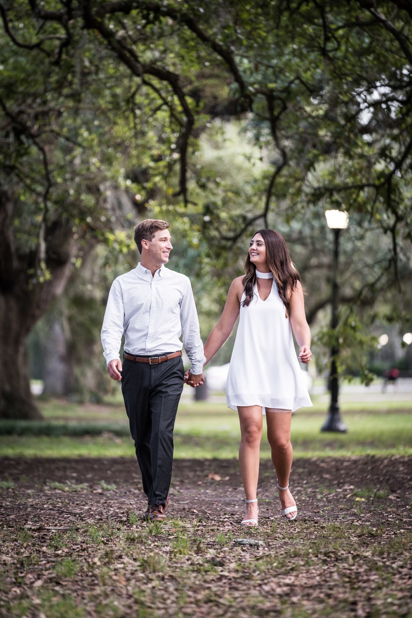 Couple walking in Audubon Park