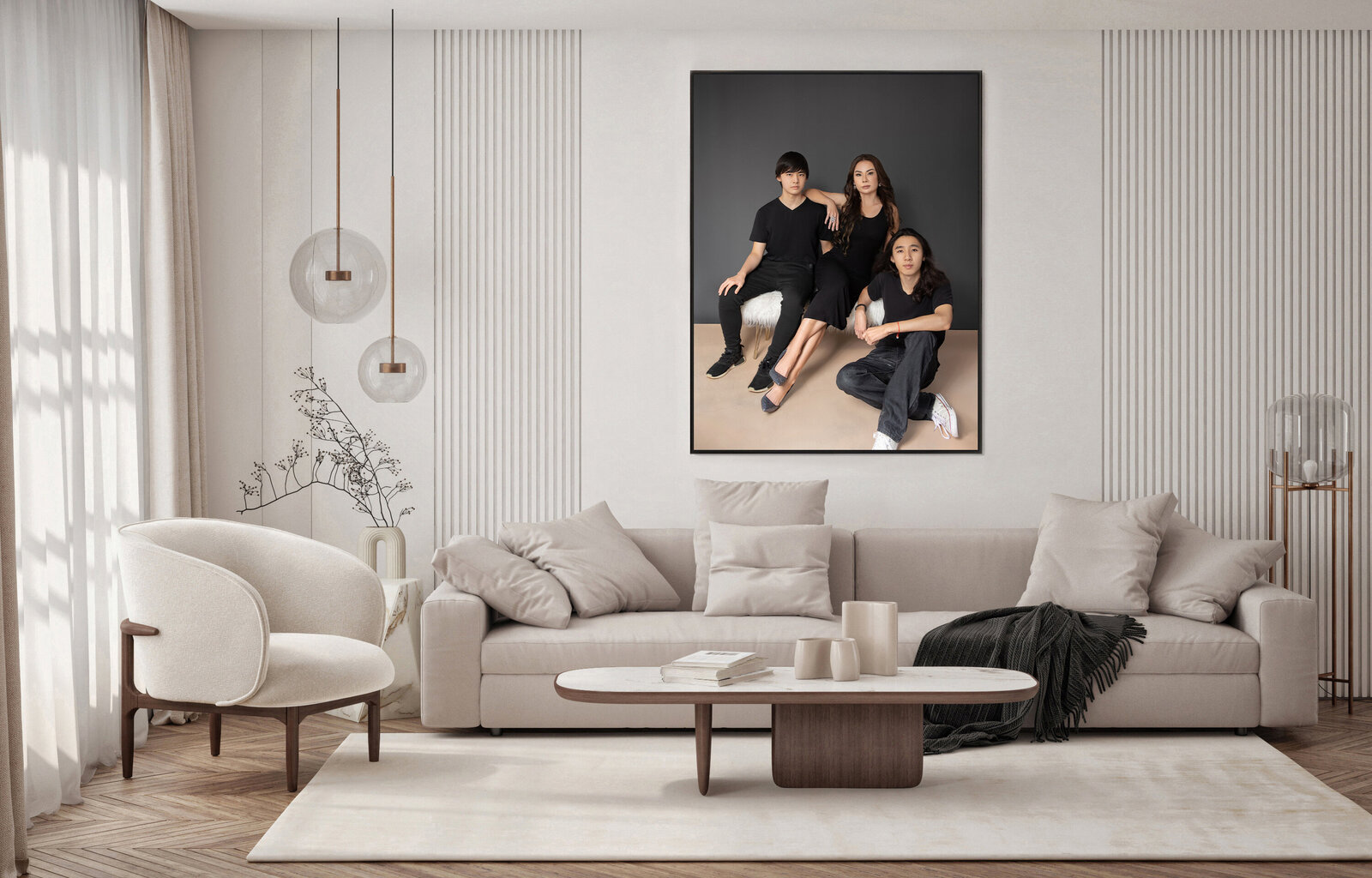 A clean and elegant looking transitional home. A big framed portrait of a family. A mother with two sons in sitting positions. Looking beautiful and elegant. Portrait is hung on the walls of their family room.