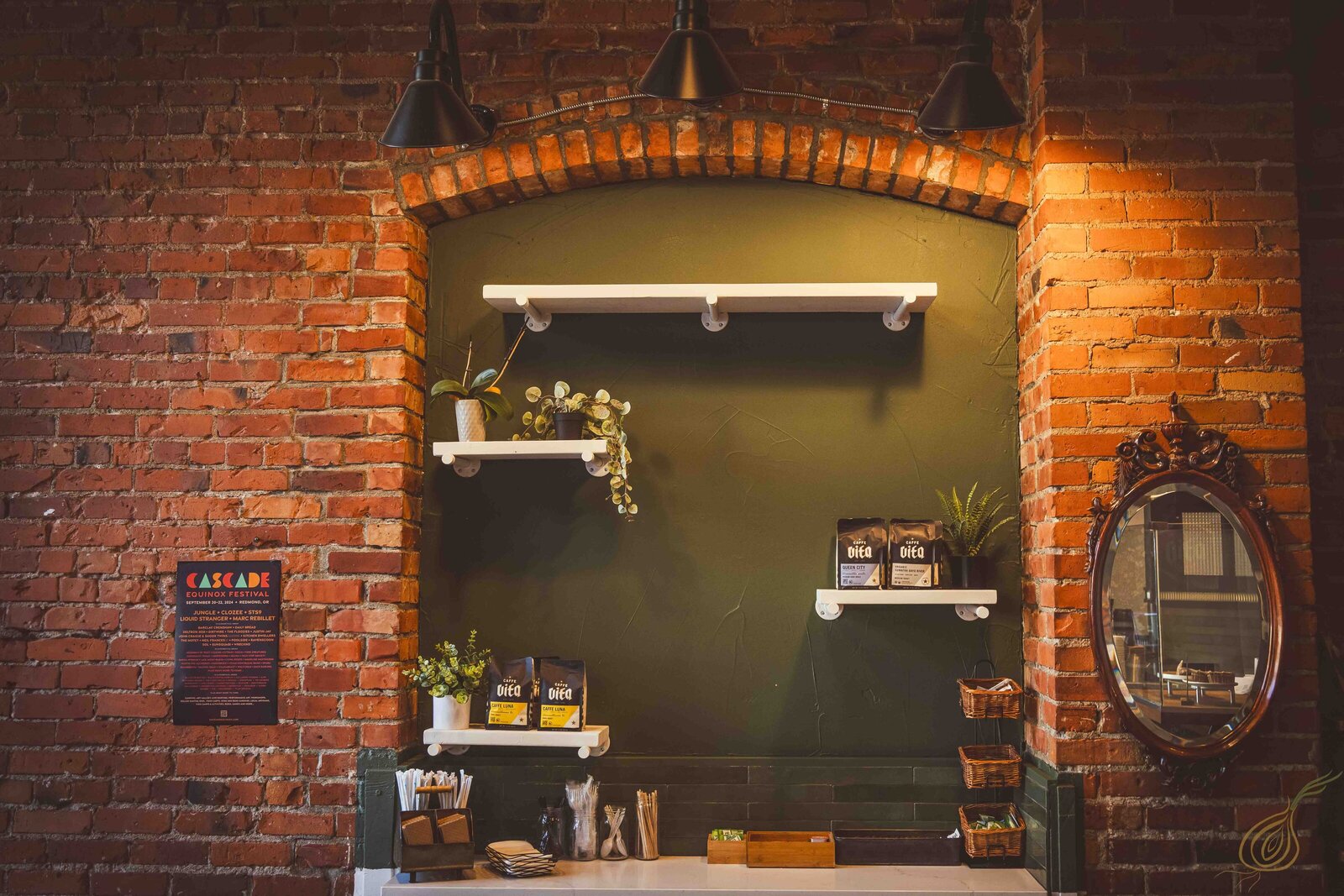 A shelf displaying an assortment of coffee products alongside various other items, showcasing diverse selections.