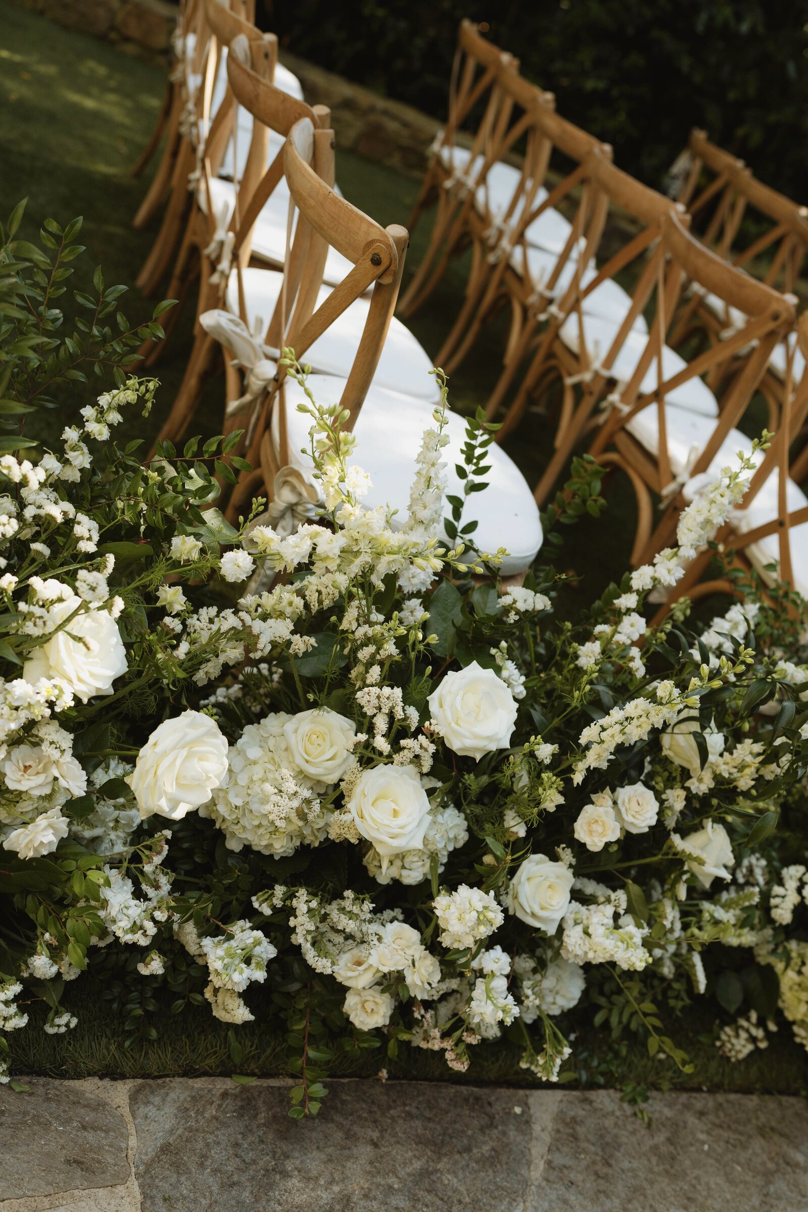 flowers and chairs at a wedding ceremony 