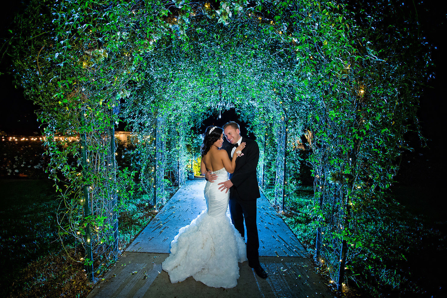 Incredible wedding portrait taken at night with ivy