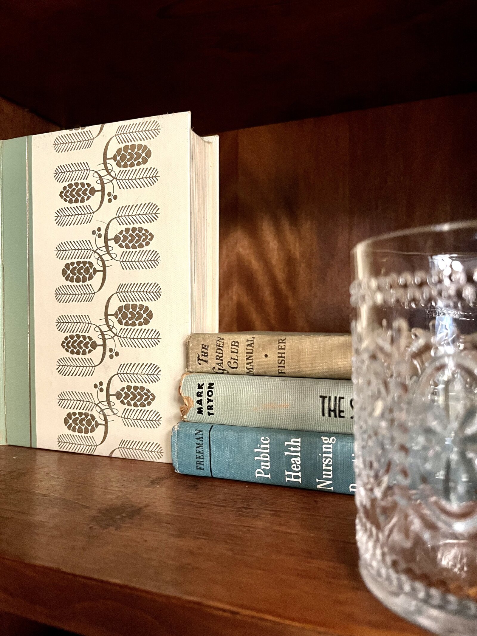 Signature glassware and vintage books