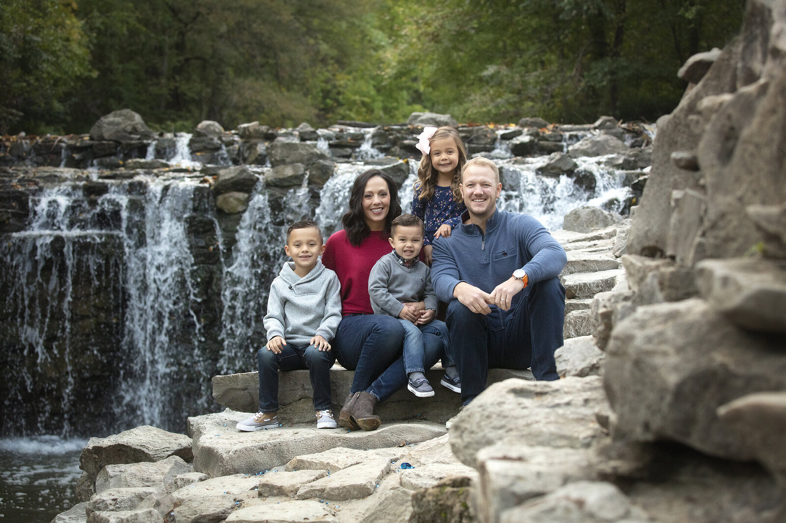 Family in front of waterfall in Prairie Creek, Dallas family photographer