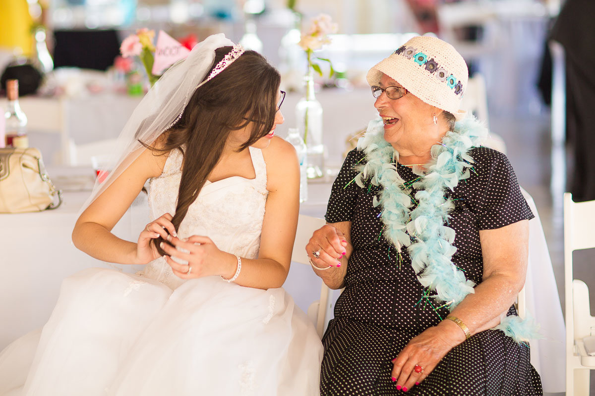 wedding photo of a bride and her mother near the bay