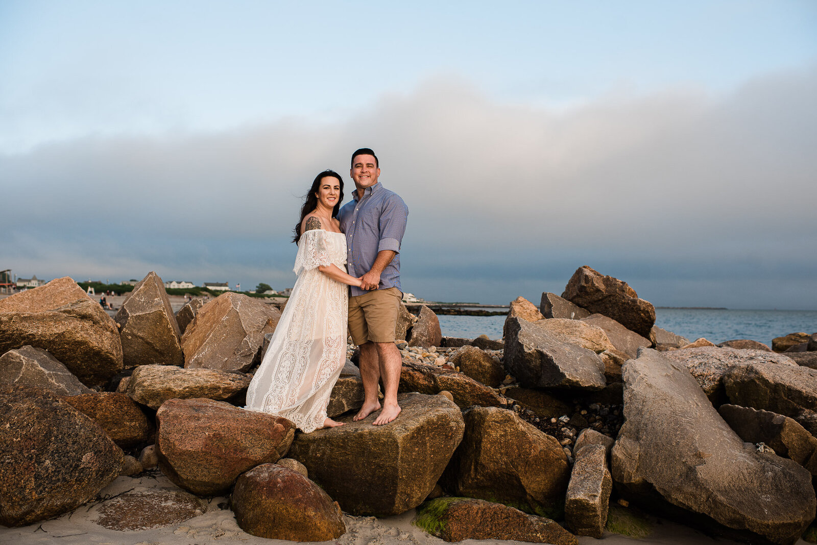couple on rocks at beach