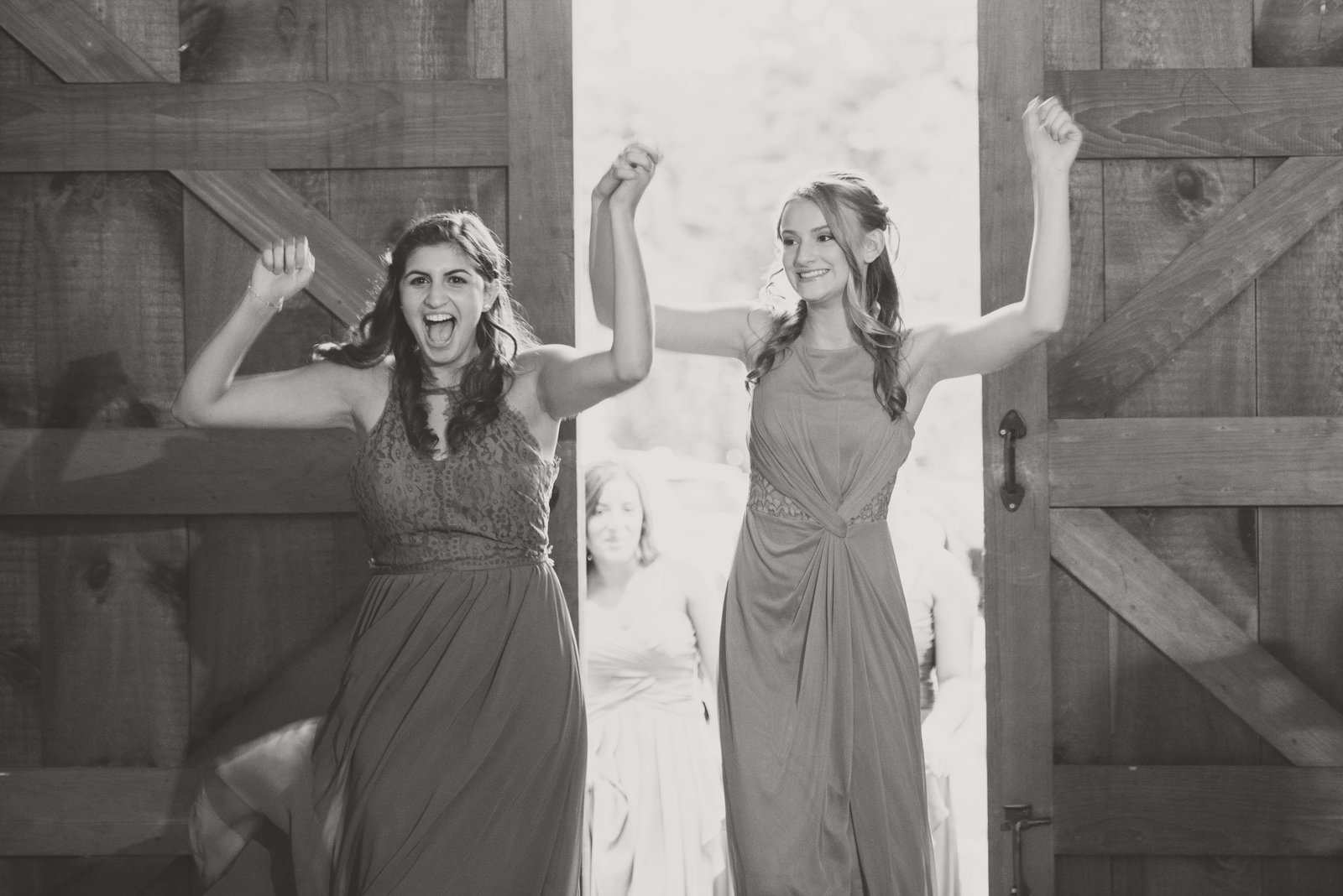 bridesmaids entering the reception at George Weir Barn