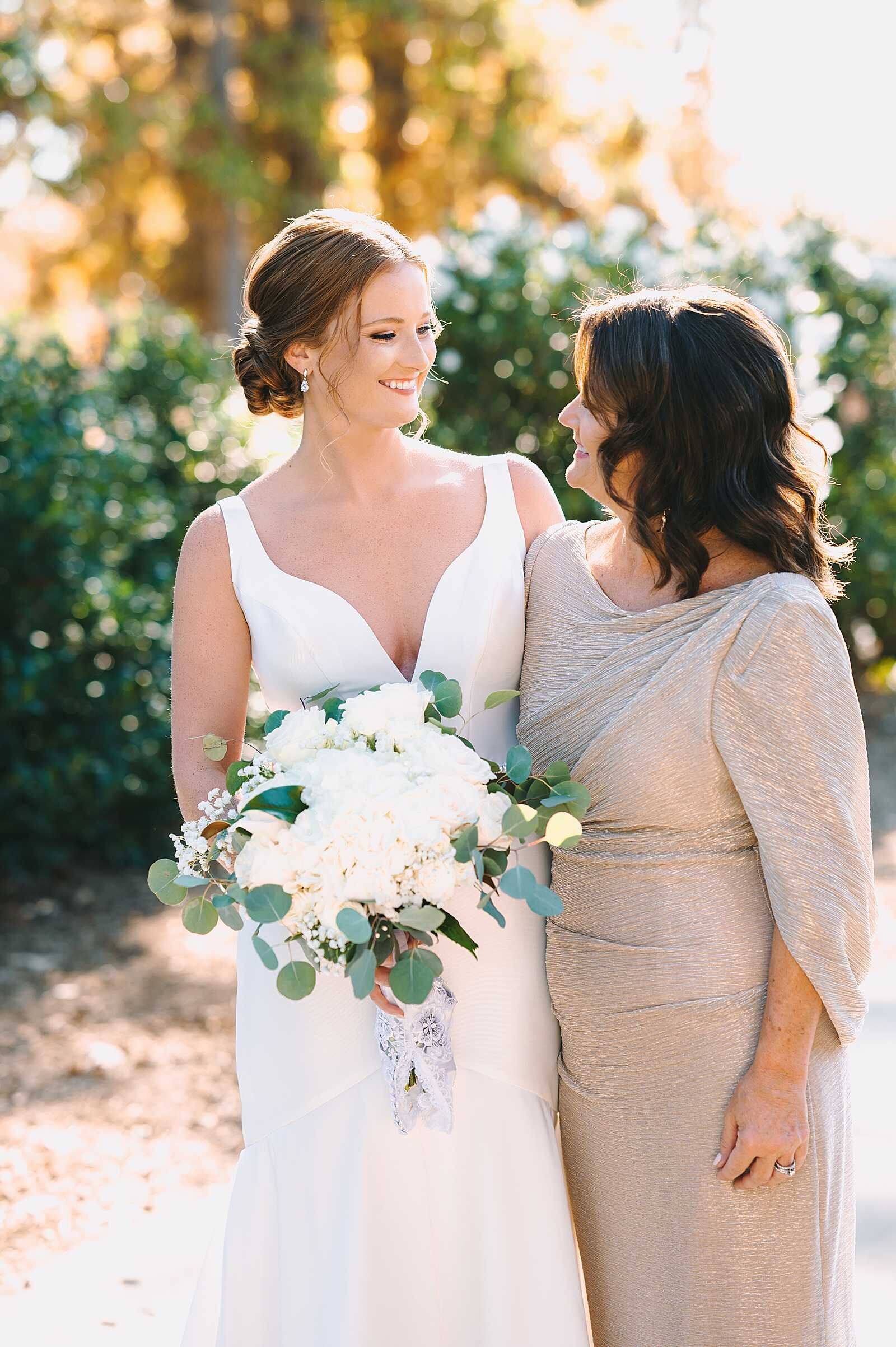 bride and mom share a sweet moment on wedding day-2