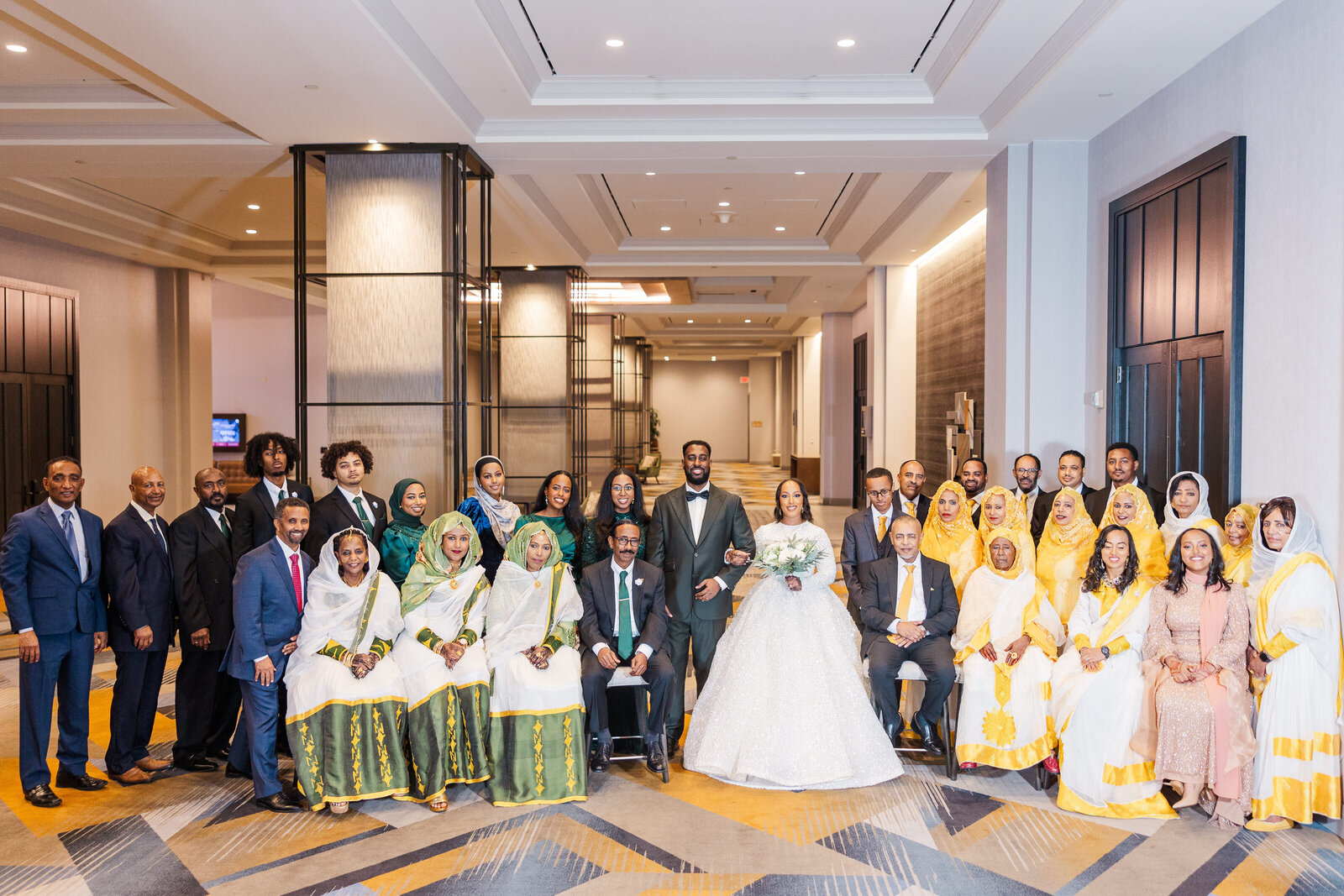 bride and groom with friends and family photography