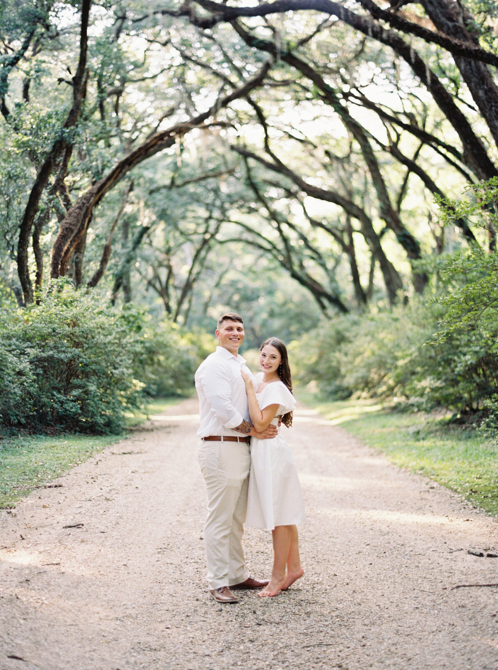 Capture your engagement at the beautiful Afton Villa Gardens with Morgan Alysse, a Louisiana film photographer.