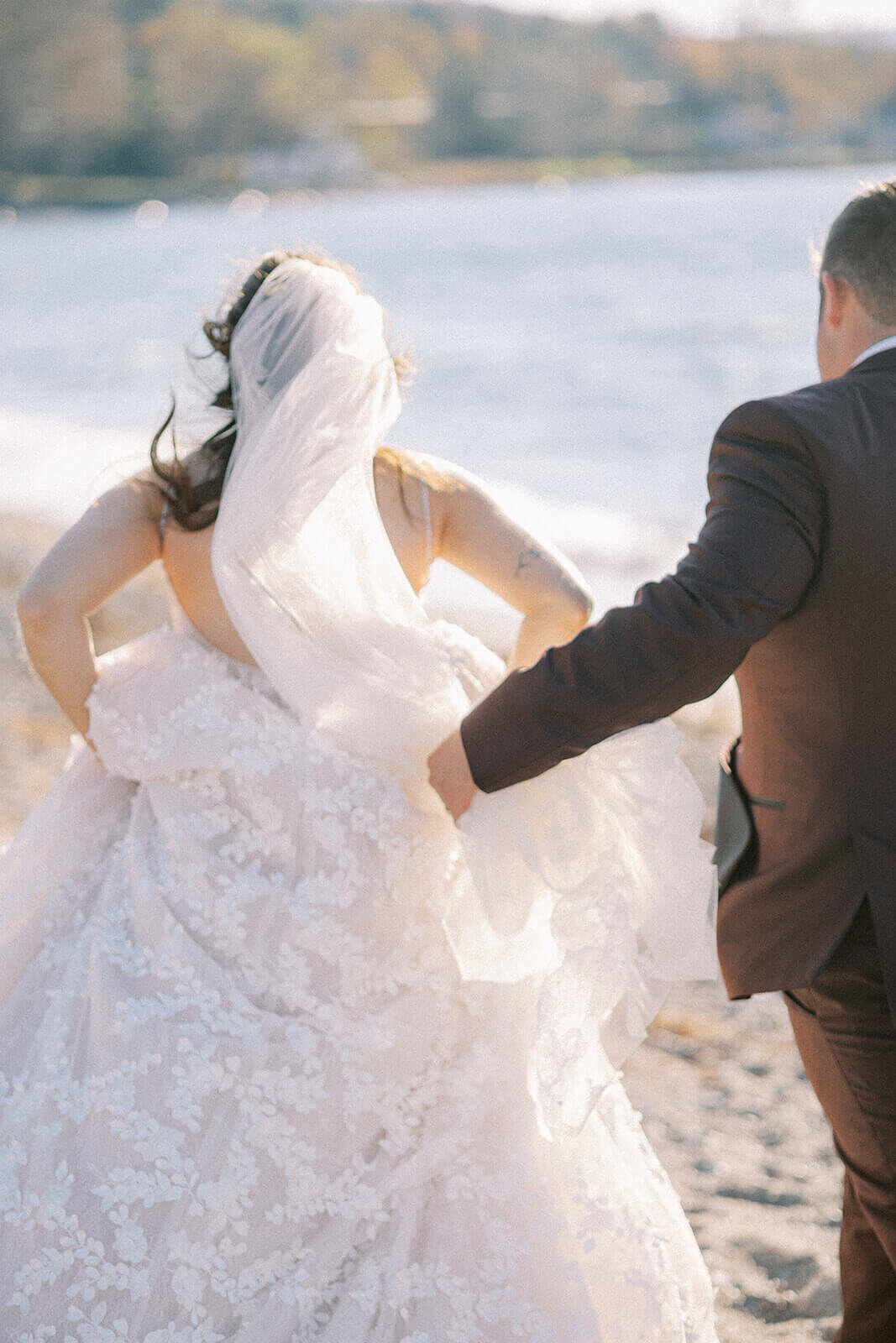 Bride-and-Groom-run-on-beach-Nova-Scotia-Photography