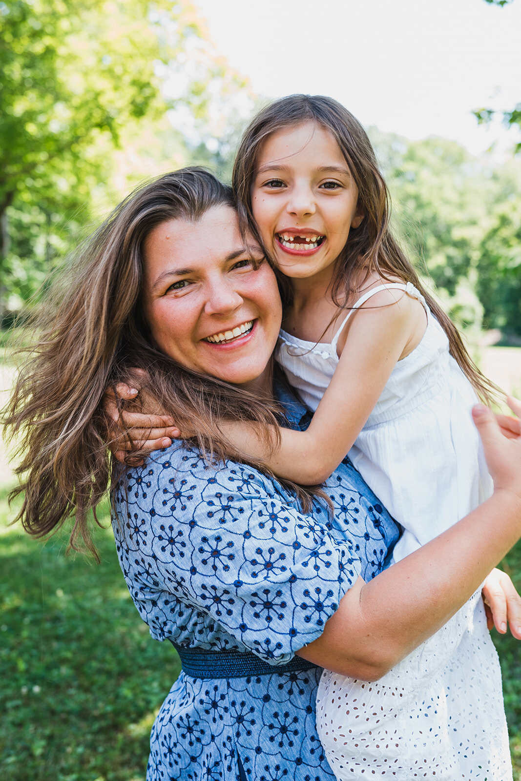 smiling-mother-daughter-candid-family-photo