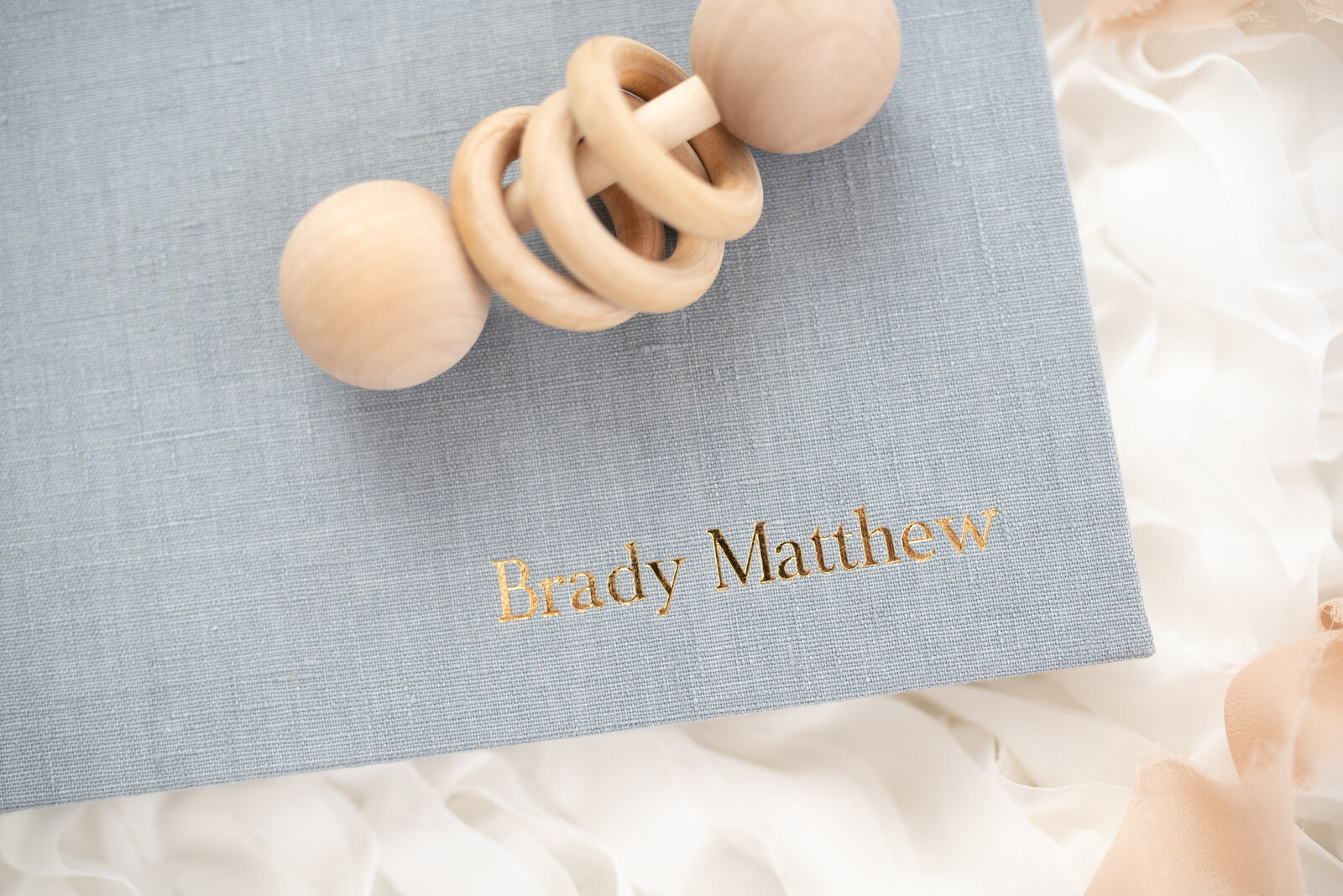 linen cover session album austin newborn photographer