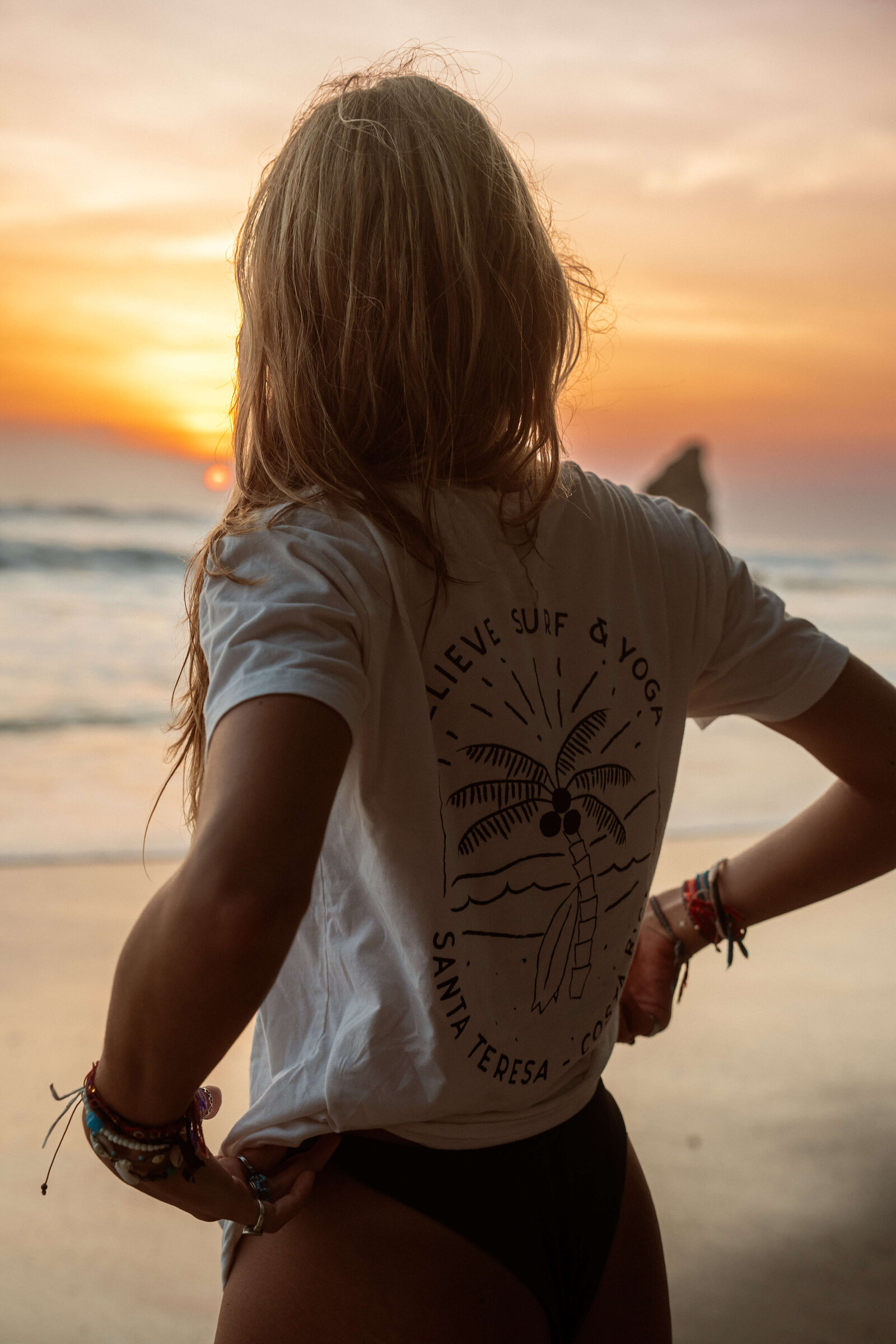 Girl on beach during sunset