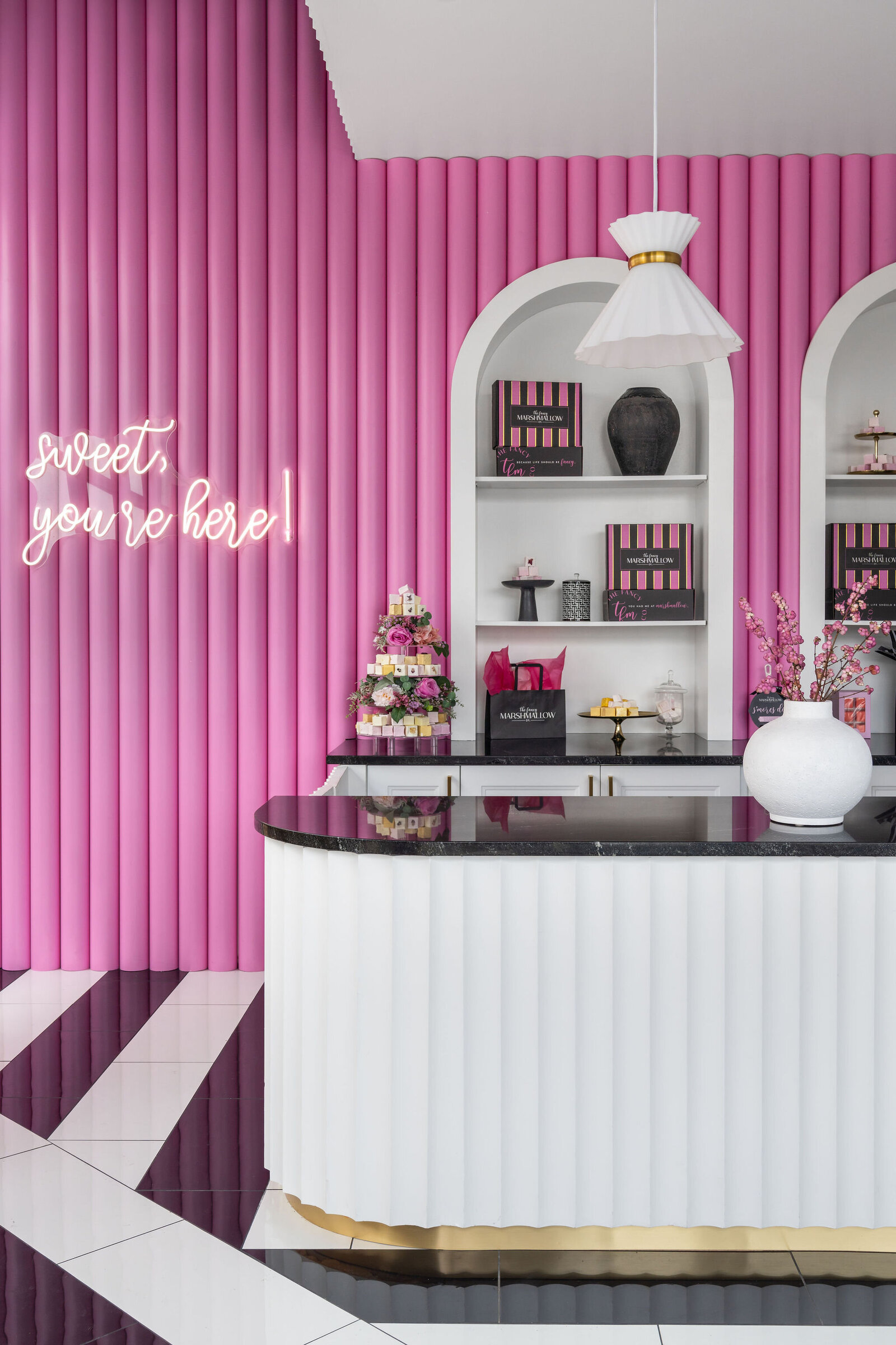 Nuela_Designs_Retail_Interior_Design_Pink_White_Black