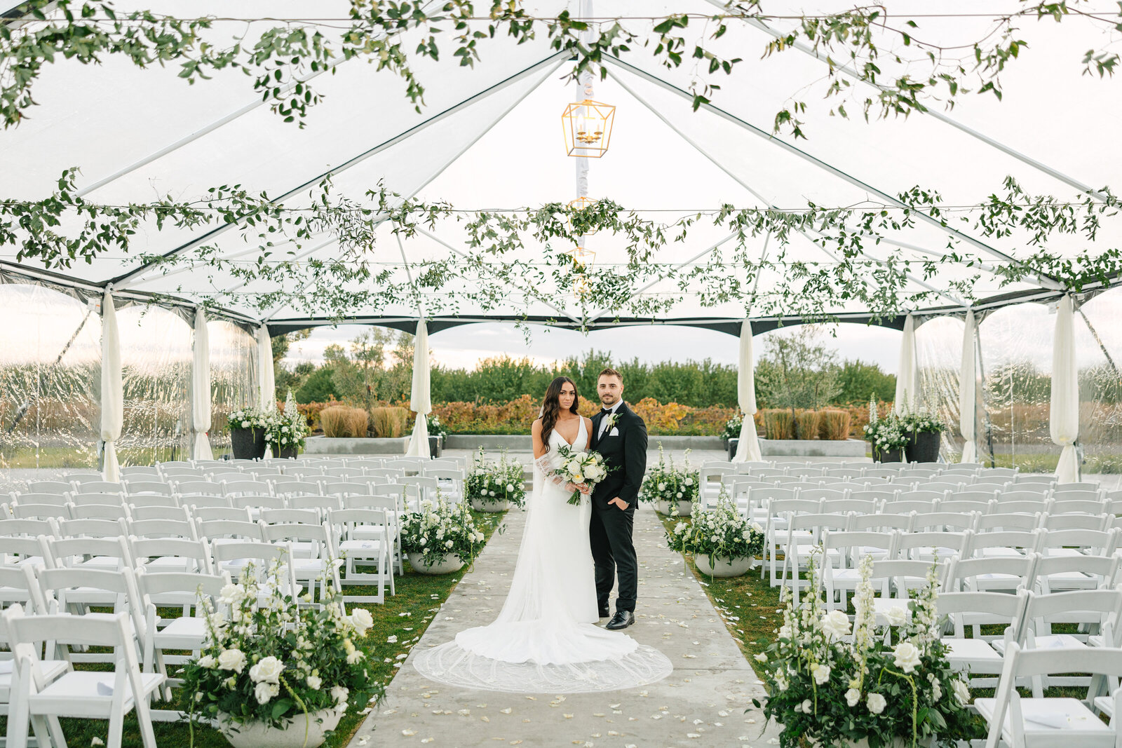 bride and groom at the altar at an outdoor wedding