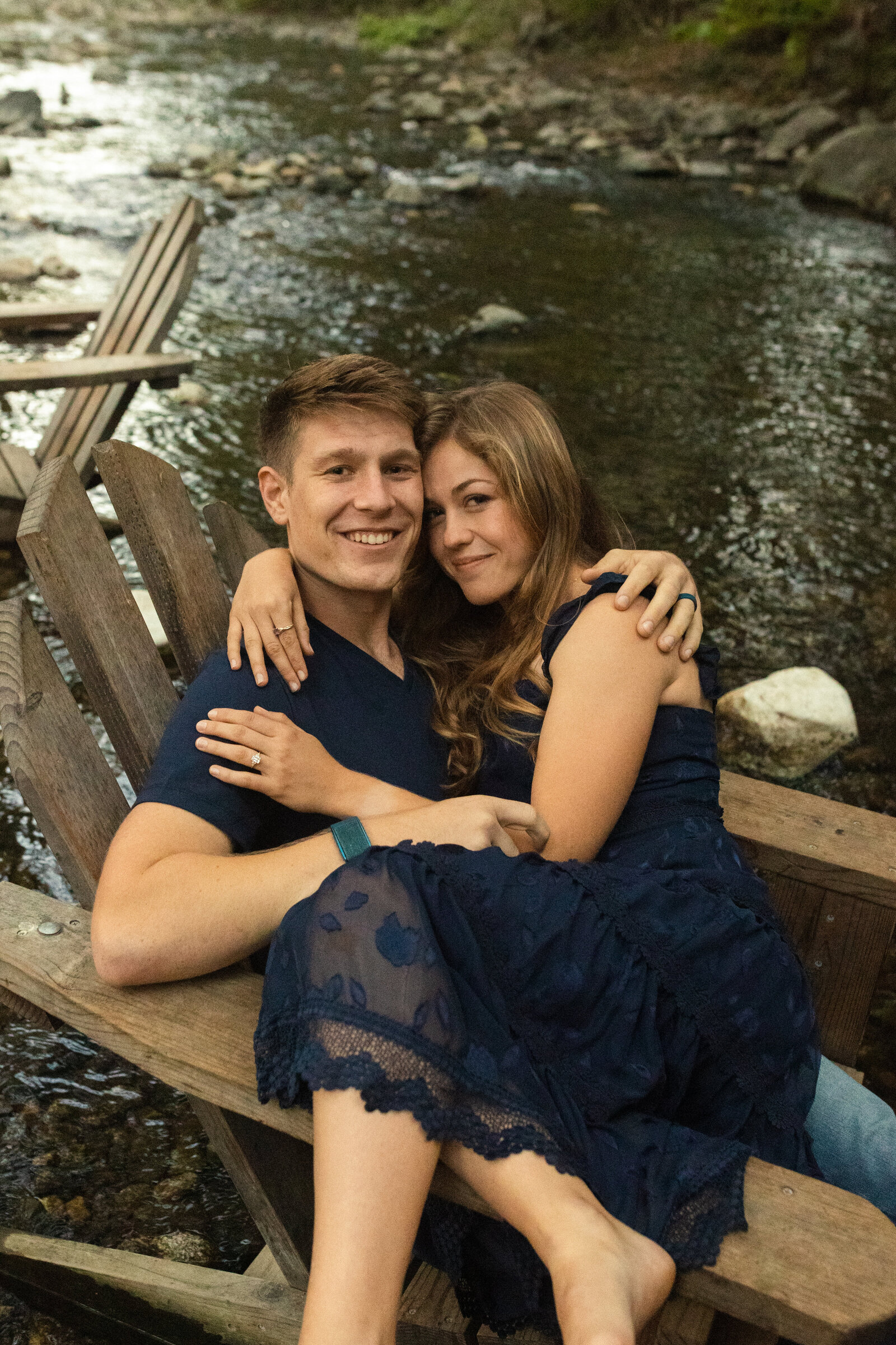 A couple poses for their engagement photos in Big Sur, California.