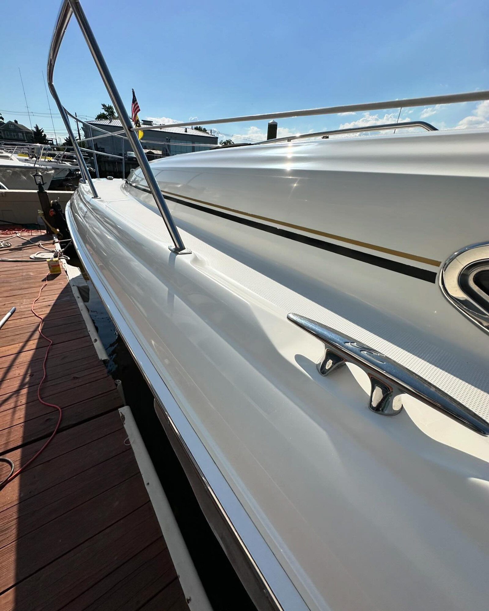 Glossy side of a boat after detailing services