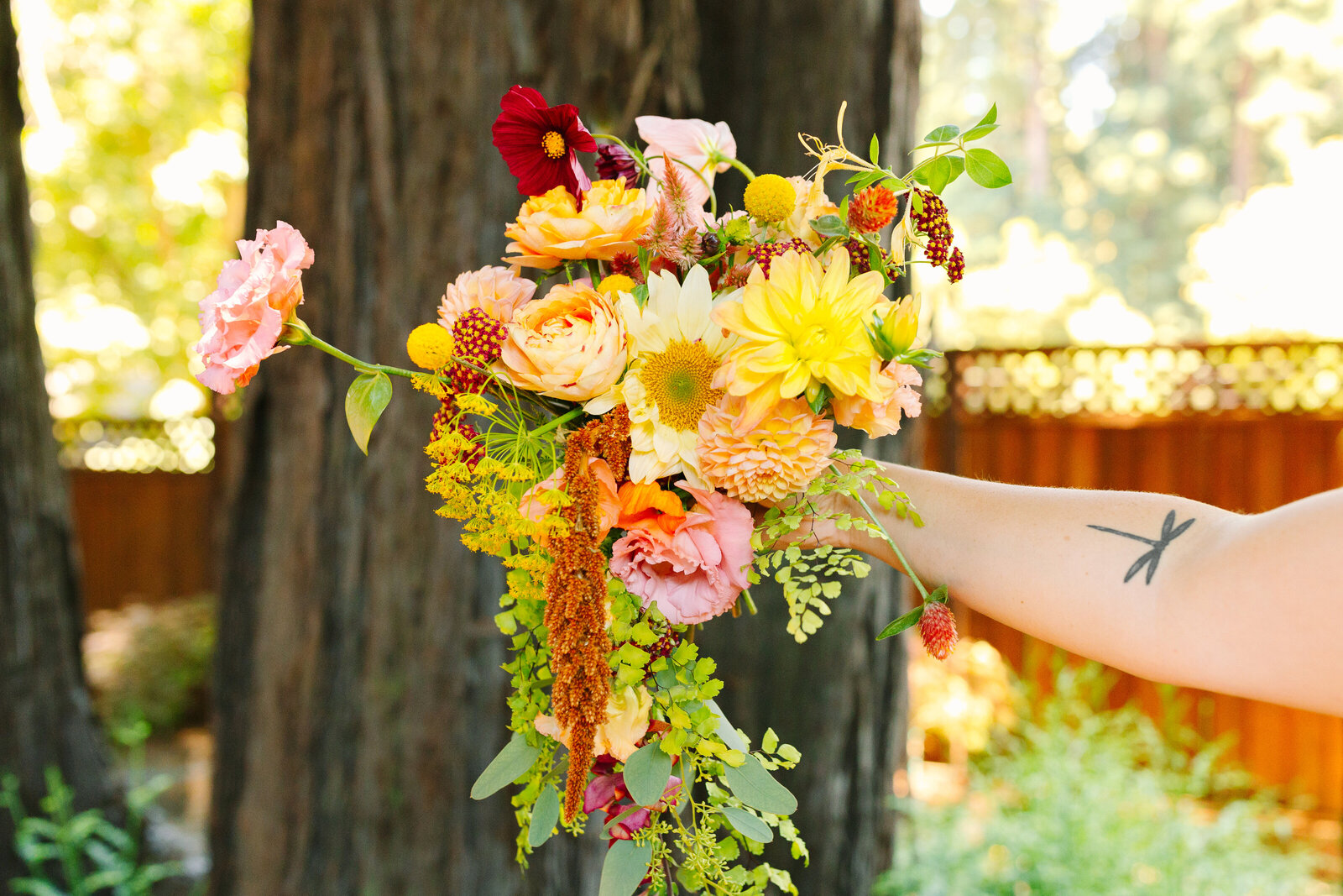 Colorful wedding flowers in Santa Cruz, California in the redwood trees.